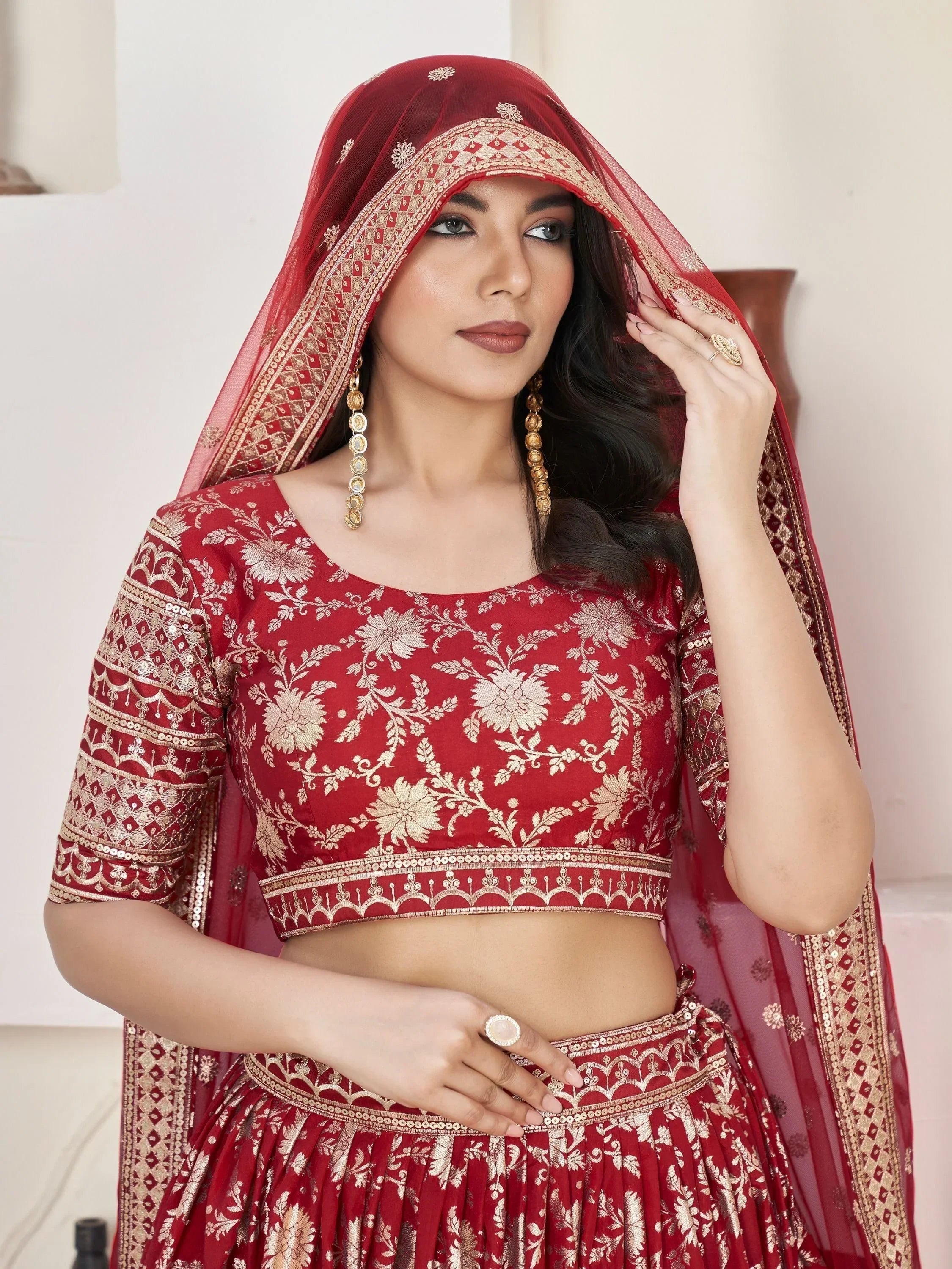 Red and gold embroidered lehenga choli with matching dupatta, Indian ethnic wear for weddings and festivals