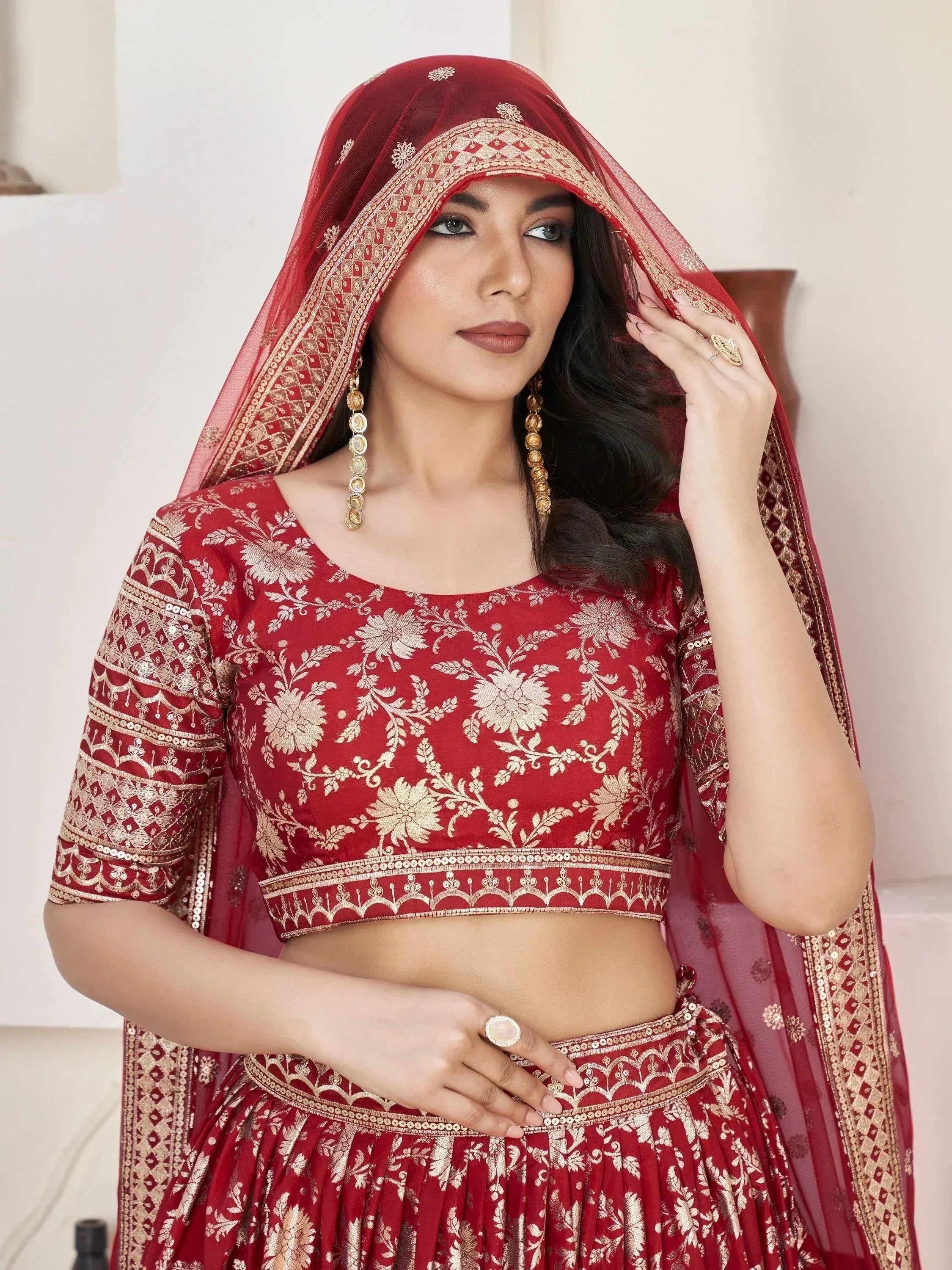 Red and gold embroidered lehenga choli with matching dupatta, Indian ethnic wear for weddings and festivals
