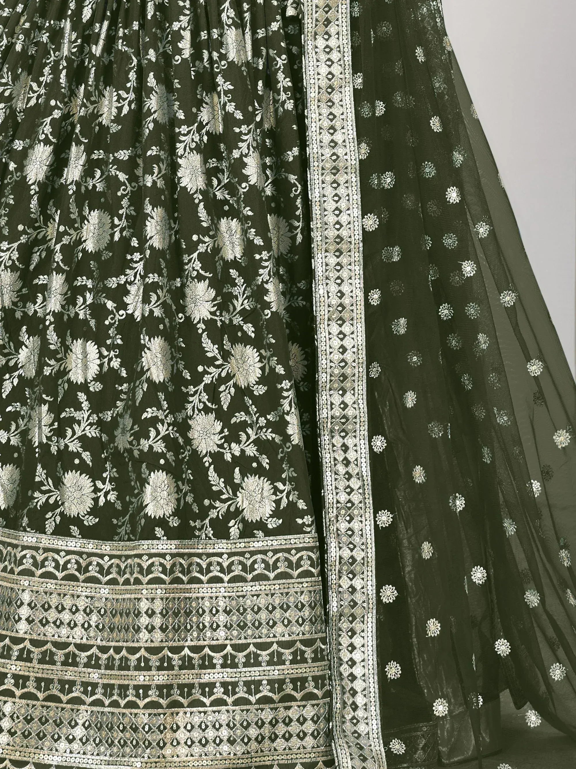 Olive green lehenga with silver floral embroidery and sequin border, ethnic Indian wear