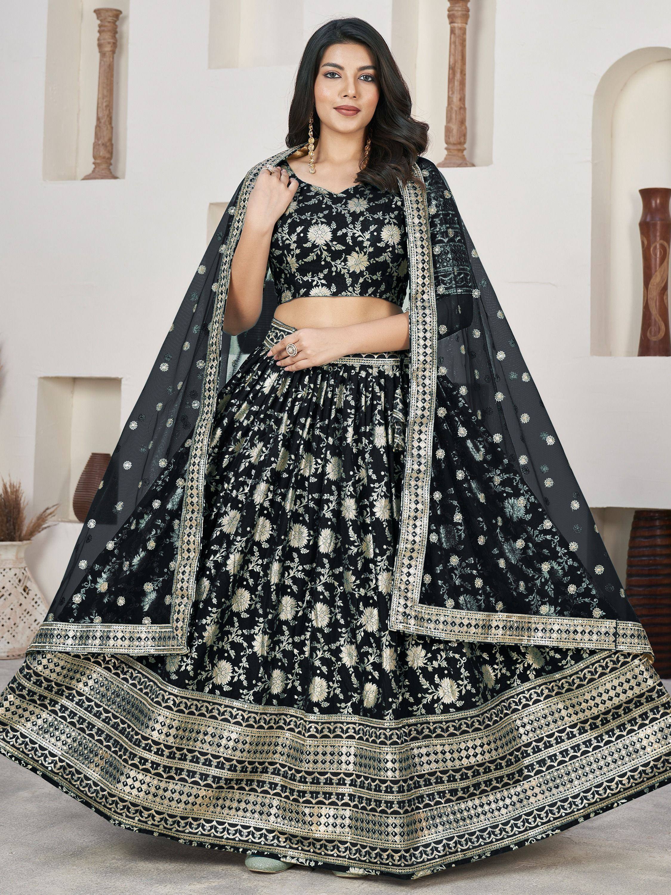 Black and gold embroidered lehenga choli with floral motifs and dupatta, ideal for Indian ethnic wear occasions.