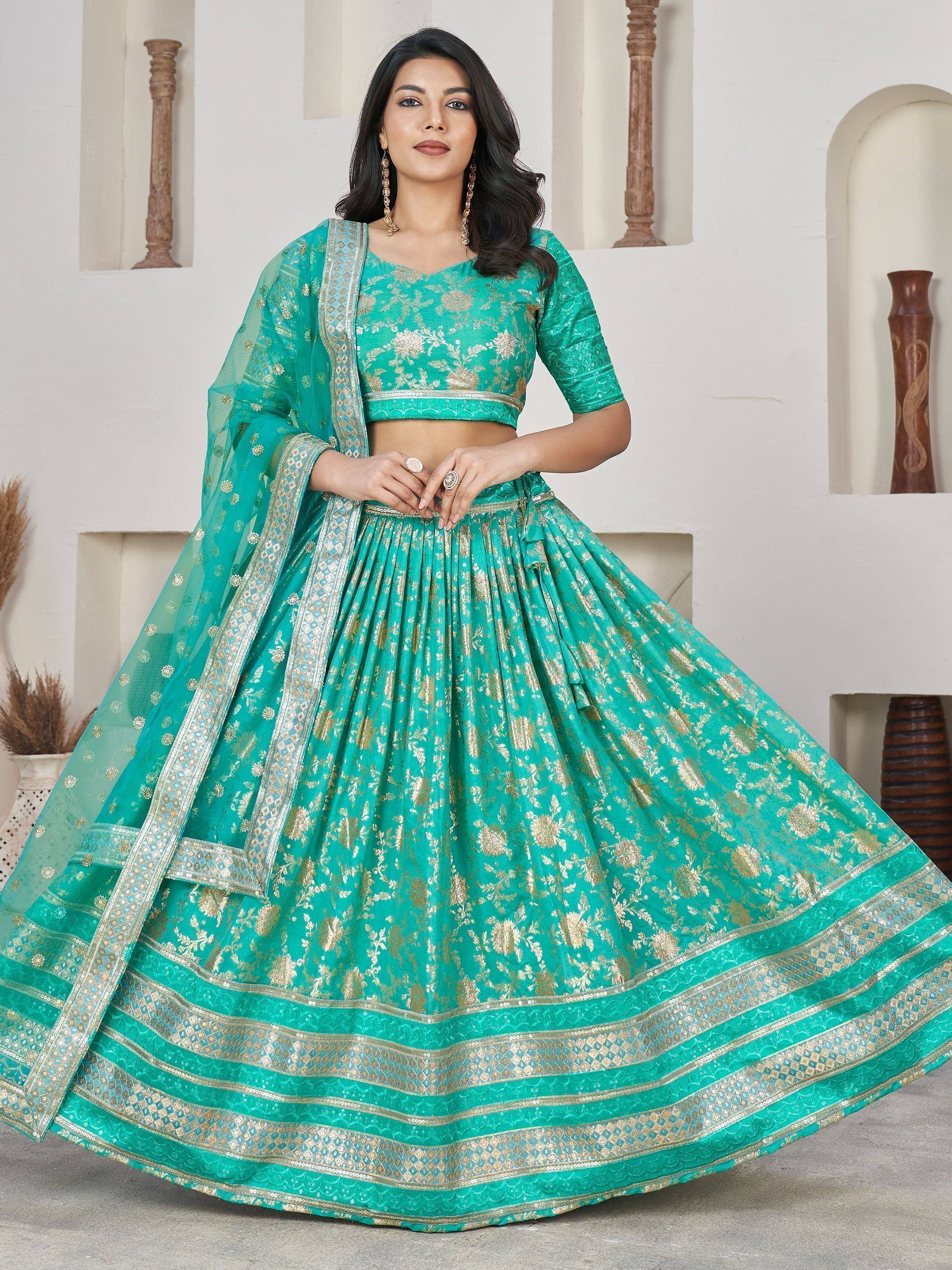 Teal green designer lehenga choli with gold floral embroidery and dupatta, perfect for Indian ethnic occasions