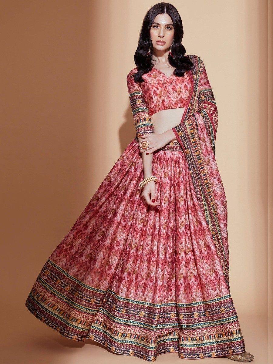 Pink printed lehenga choli with ethnic border, perfect for Indian weddings and festive occasions