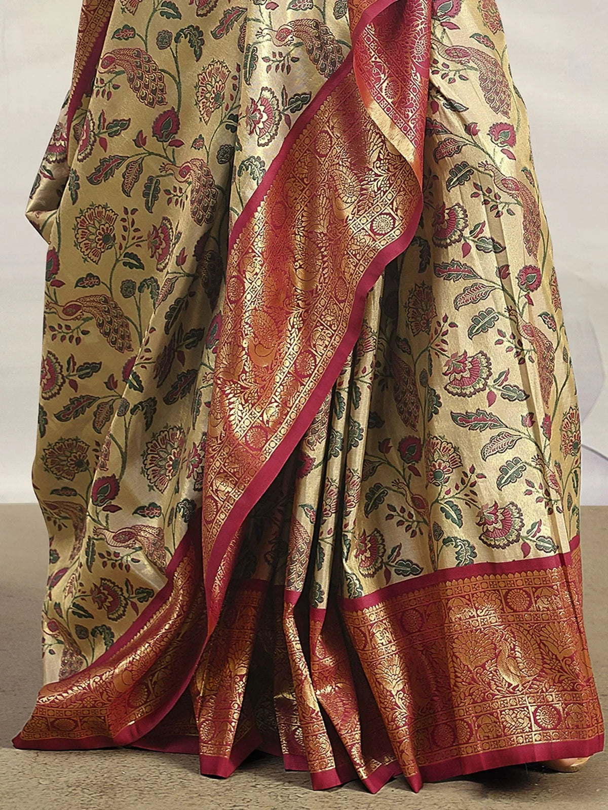 Gold and maroon floral print saree with intricate paisley and border design, ideal for Indian ethnic wear