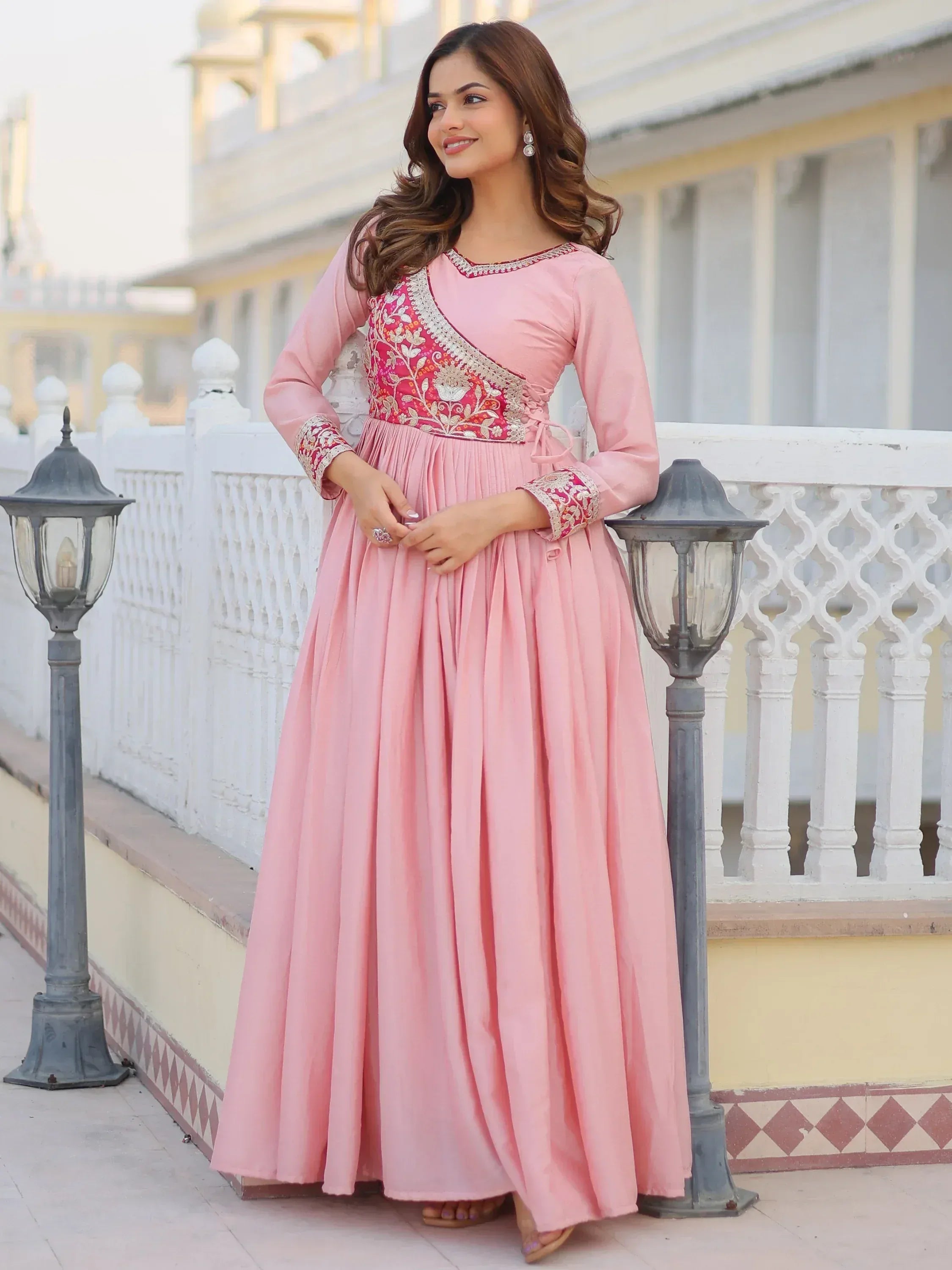 Pink embroidered ethnic gown with floral detailing, perfect for Indian occasions and festive wear