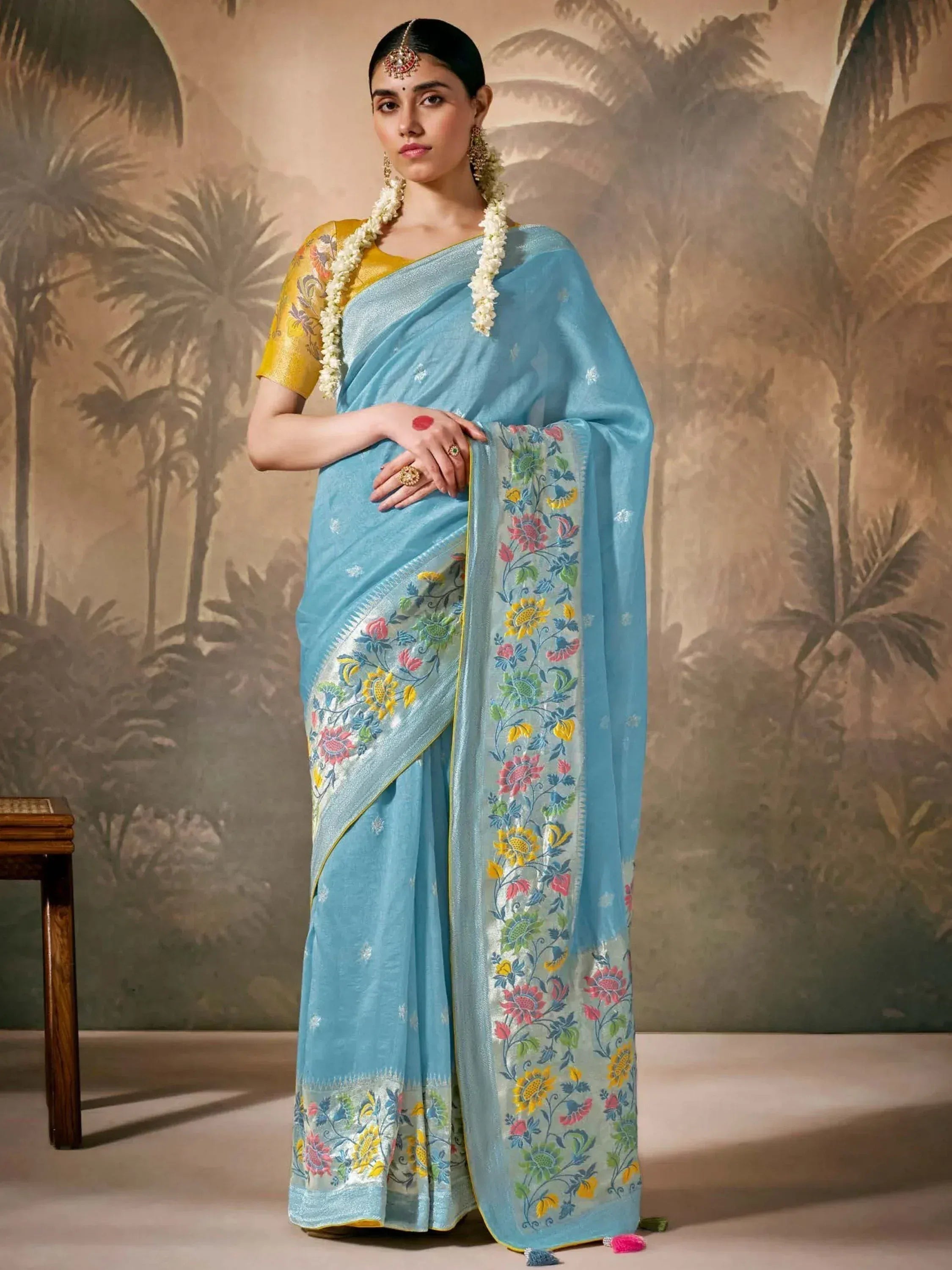 Light blue floral embroidered saree with yellow blouse, traditional Indian ethnic wear for women