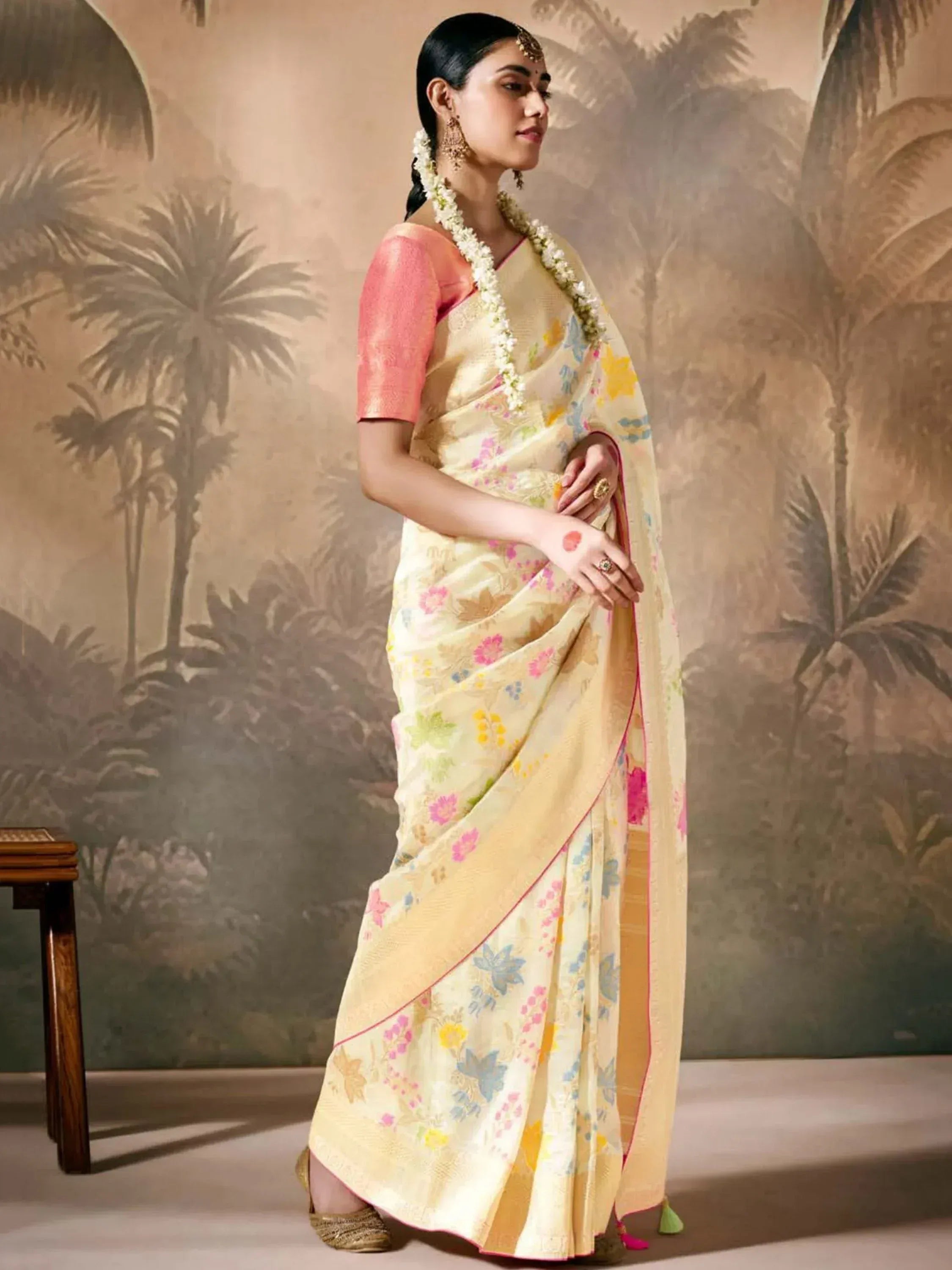 Elegant floral print saree with pink blouse, perfect for Indian ethnic occasions and festive wear.