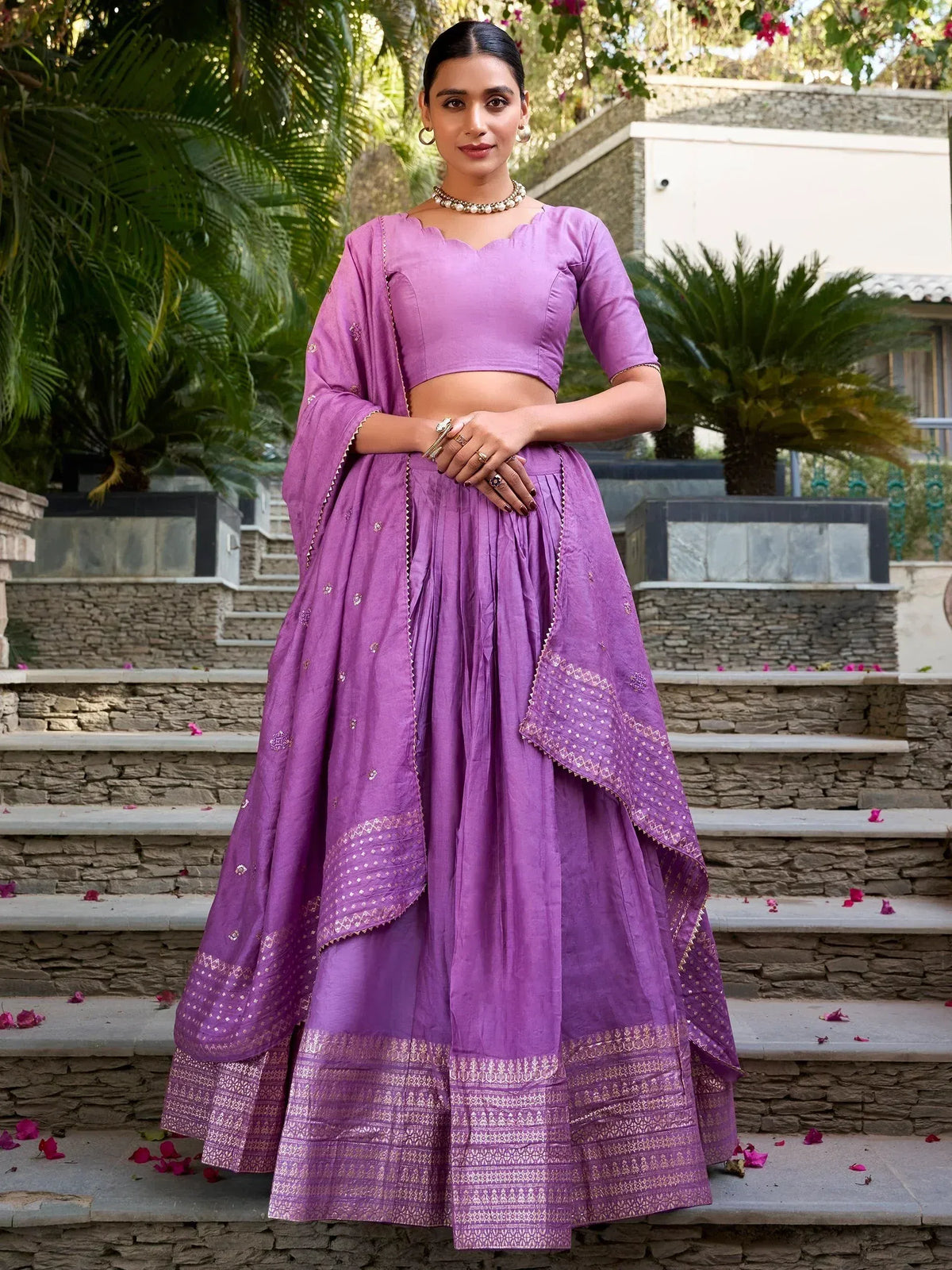 Purple designer lehenga choli with gold embroidery, perfect for Indian ethnic wear occasions