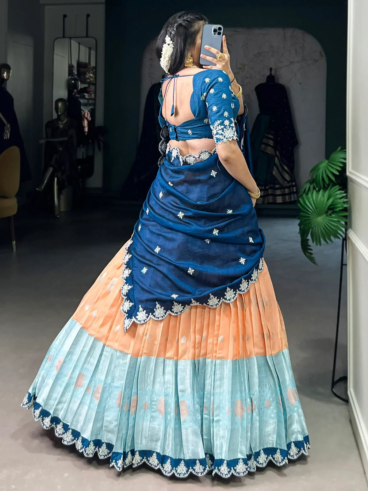 Blue and peach lehenga choli with floral embroidery, back view, ethnic Indian wear