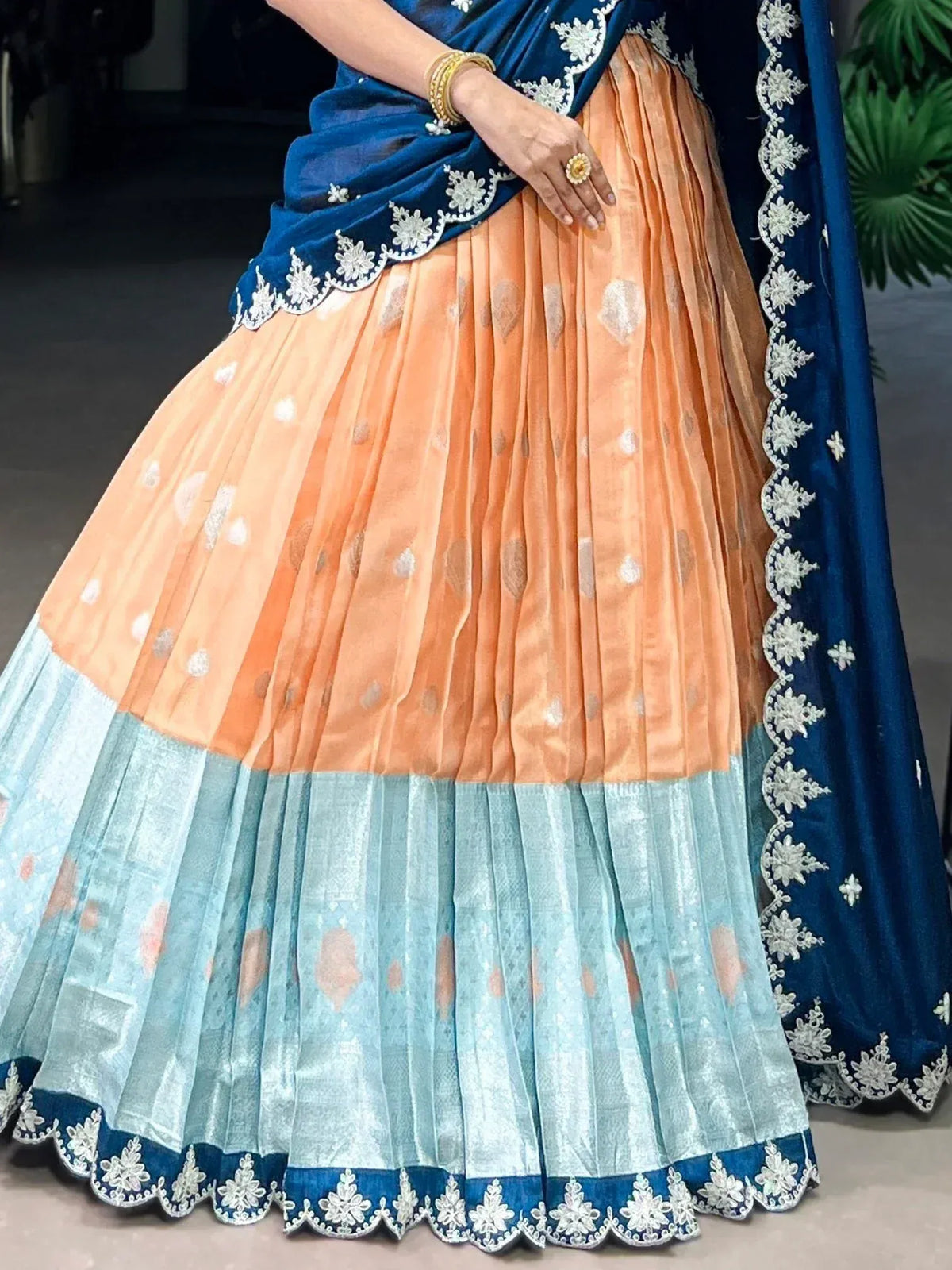 Peach and blue designer lehenga choli with embroidered dupatta, perfect for Indian ethnic wear occasions