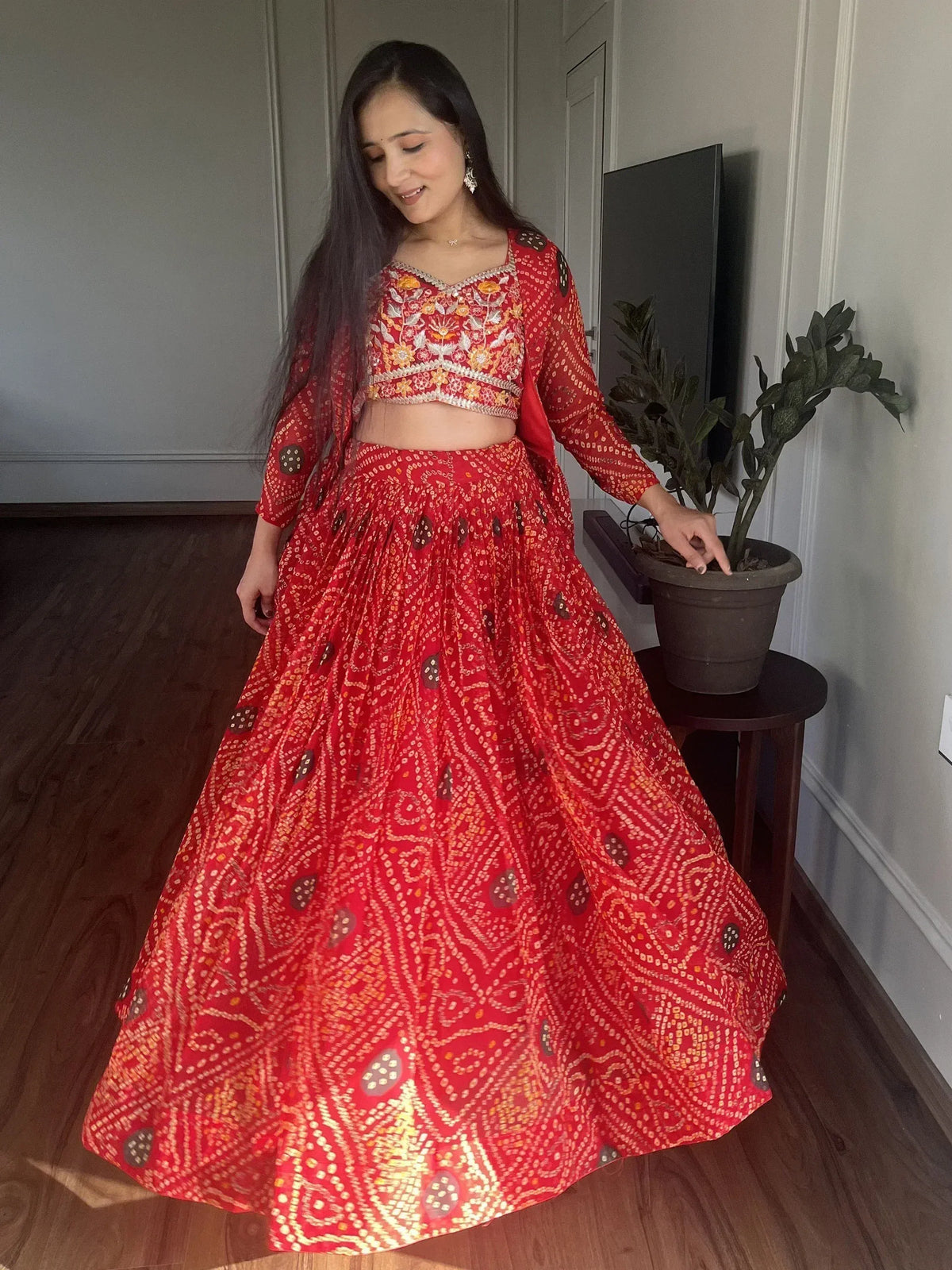 Red printed lehenga choli with floral embroidery, ethnic Indian wear for women