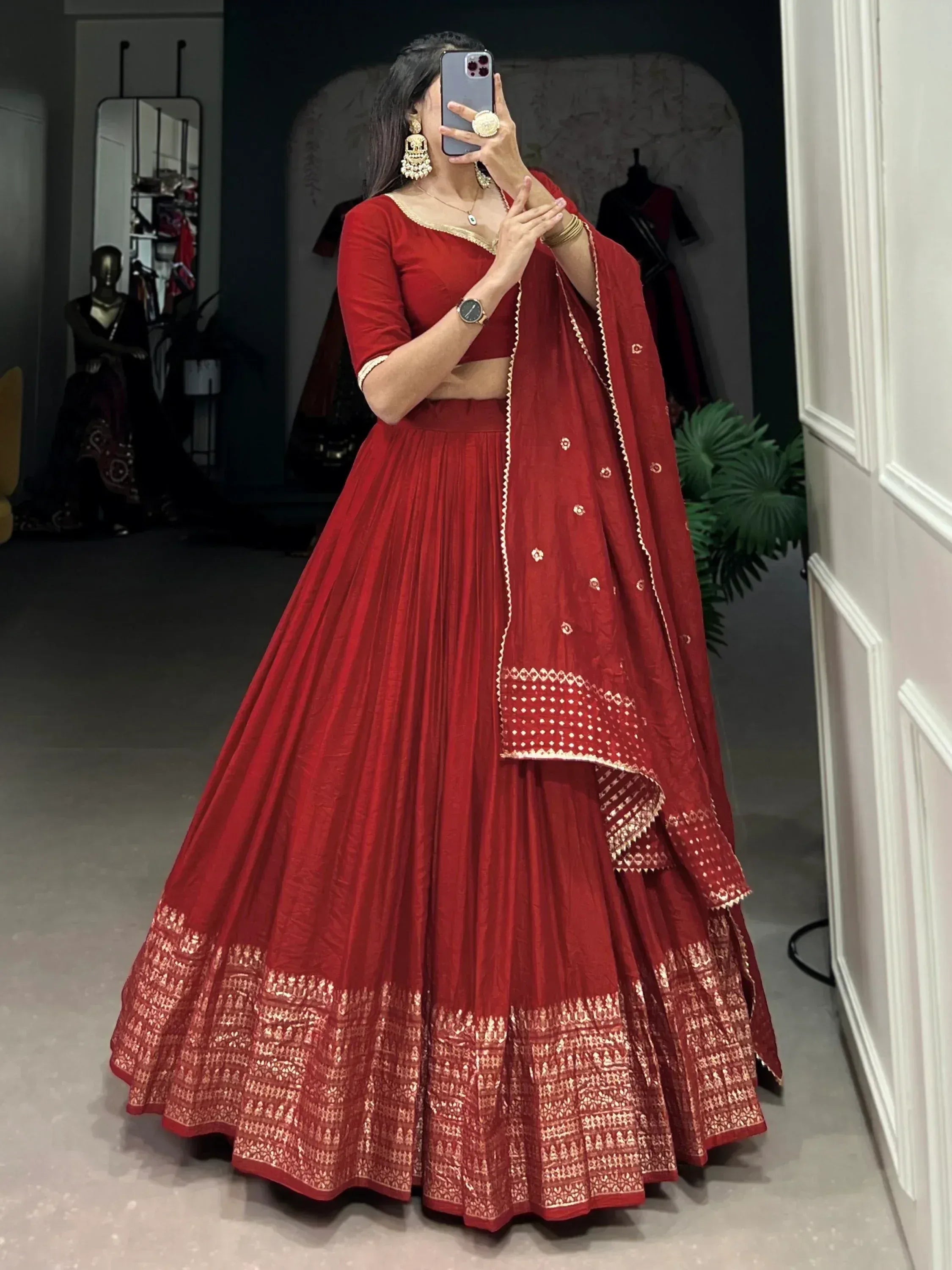 Red lehenga choli with gold embroidery, perfect for Indian weddings and festive occasions