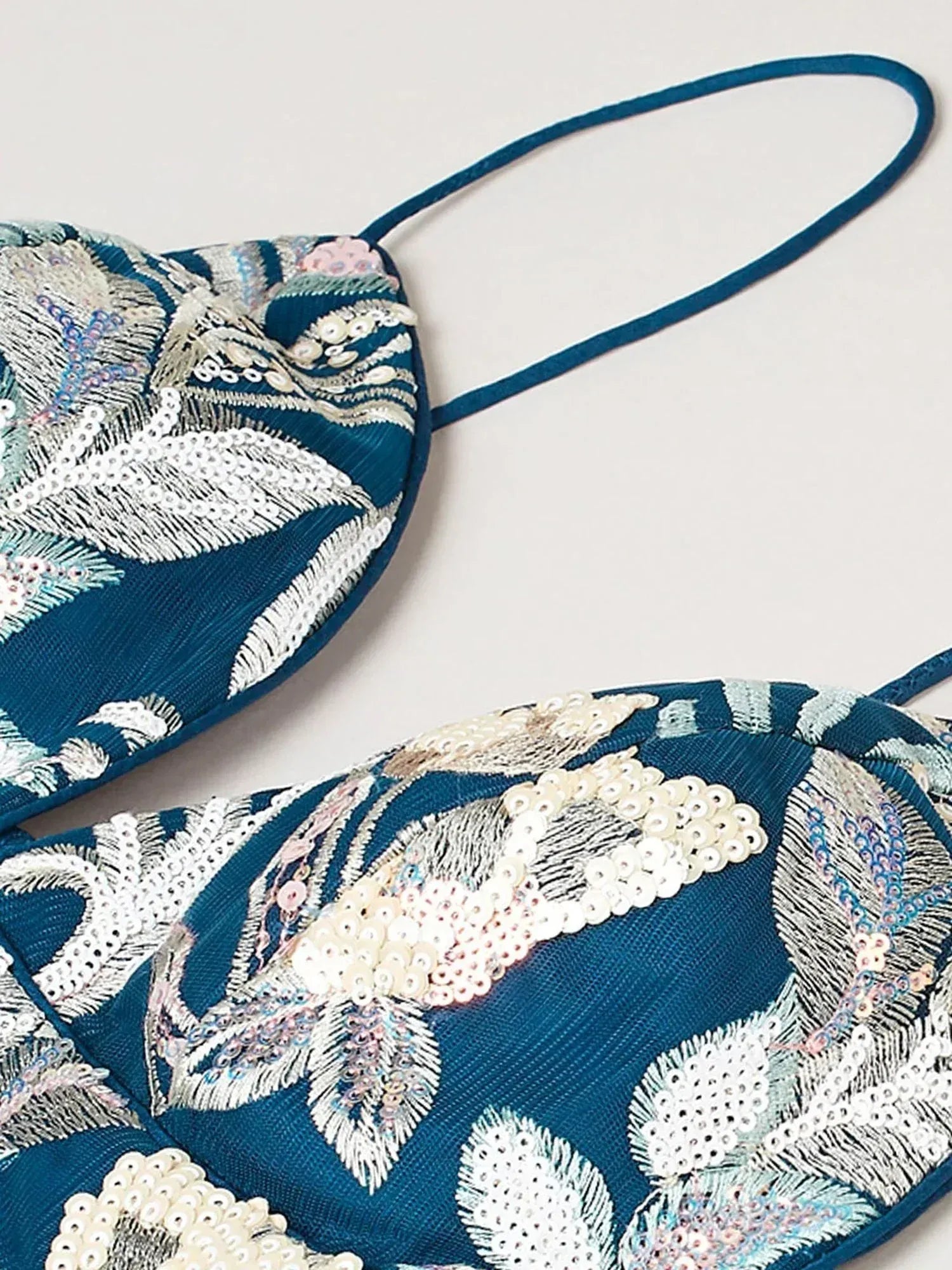 Teal embroidered blouse with floral sequin detailing, perfect for ethnic wear