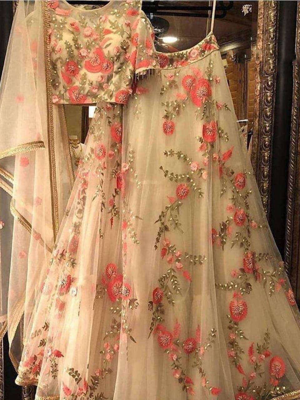 Floral embroidered lehenga choli with sheer dupatta, perfect for Indian weddings and festive occasions