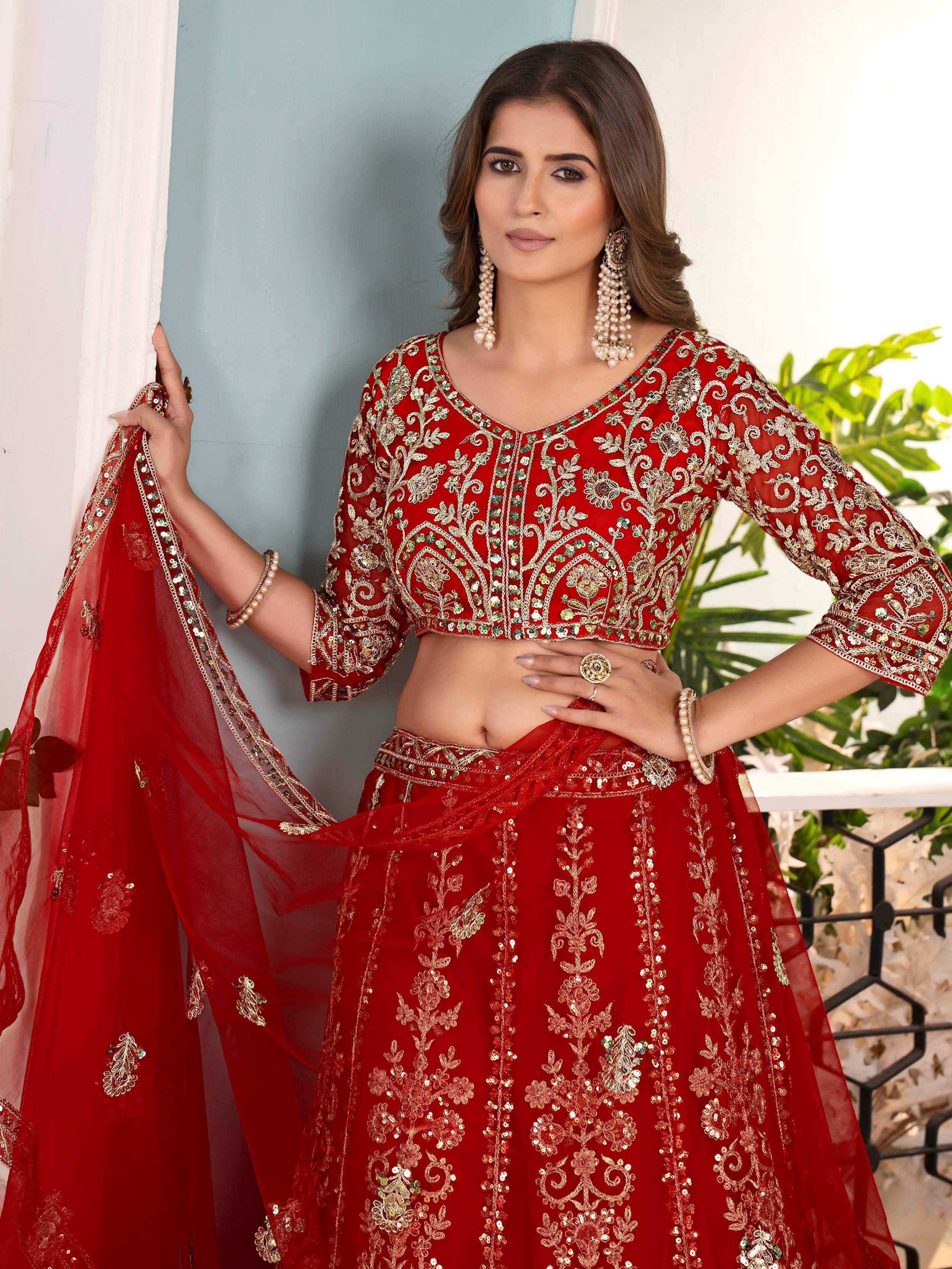 Red embroidered lehenga choli with gold floral work, perfect for Indian weddings and festive occasions