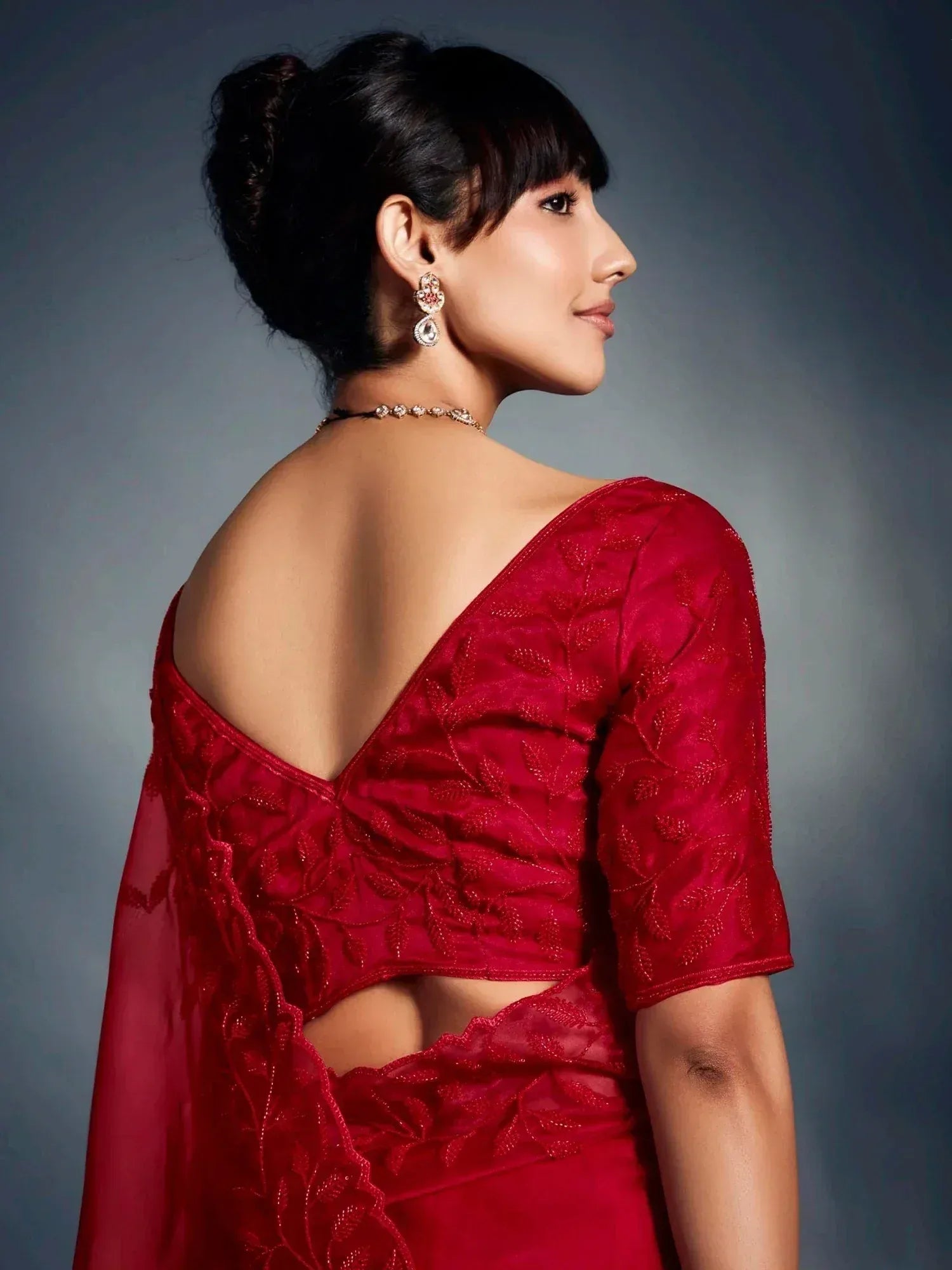 Red embroidered saree with backless blouse, ethnic Indian wear for women