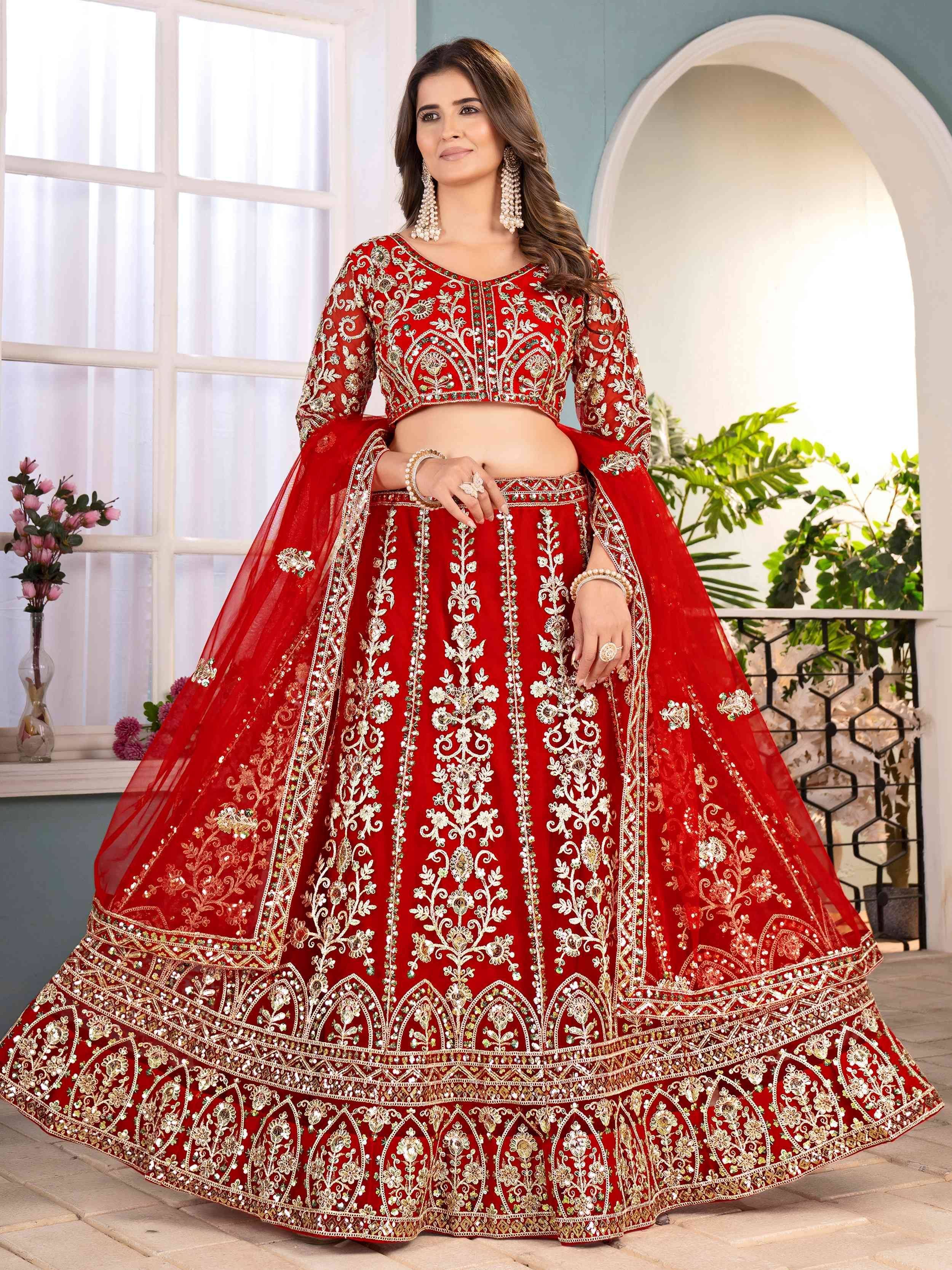 Red embroidered lehenga choli with gold floral work, perfect for Indian weddings and festive occasions