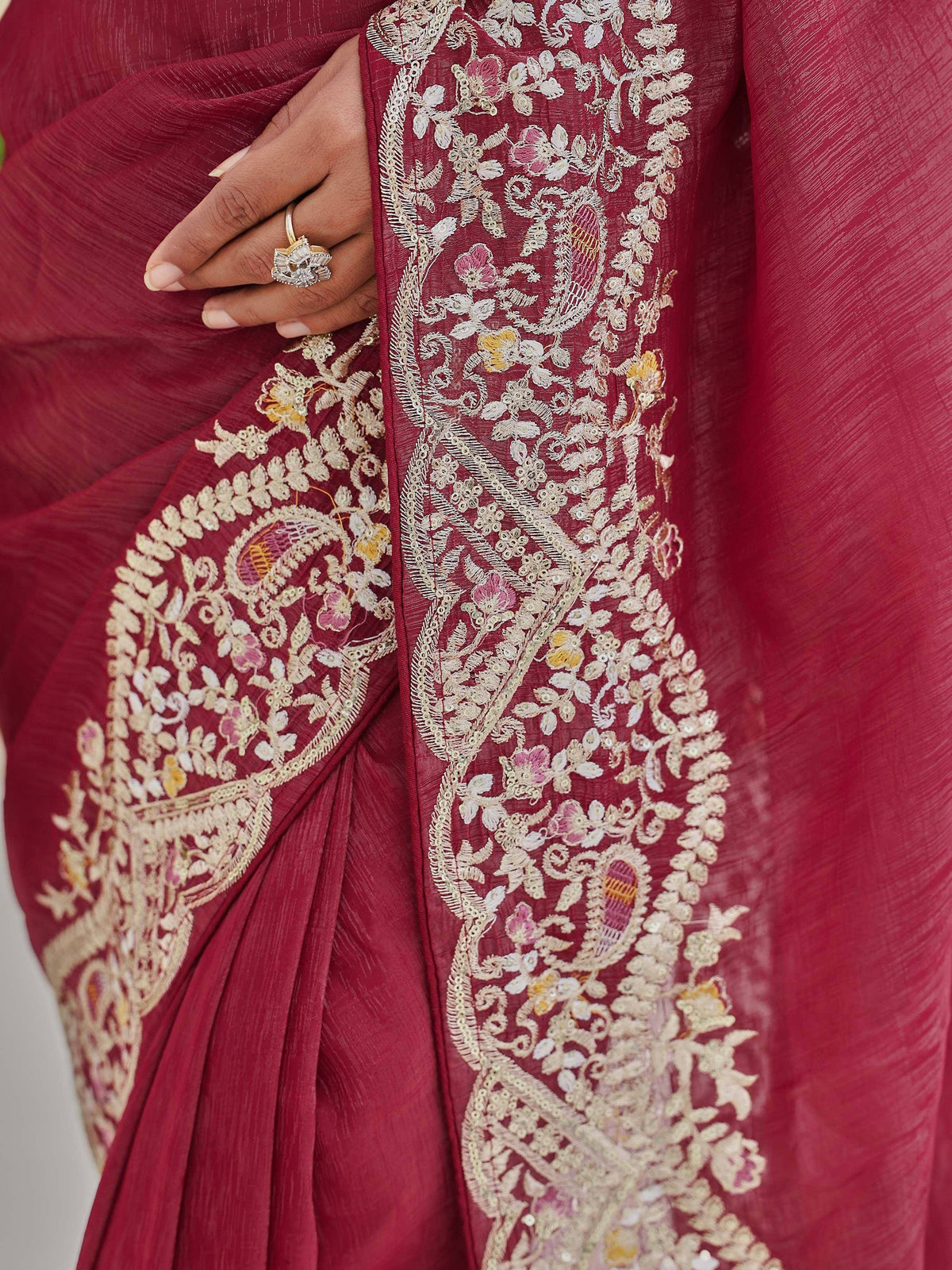 Maroon saree with intricate floral embroidery and gold thread work, perfect for Indian ethnic occasions