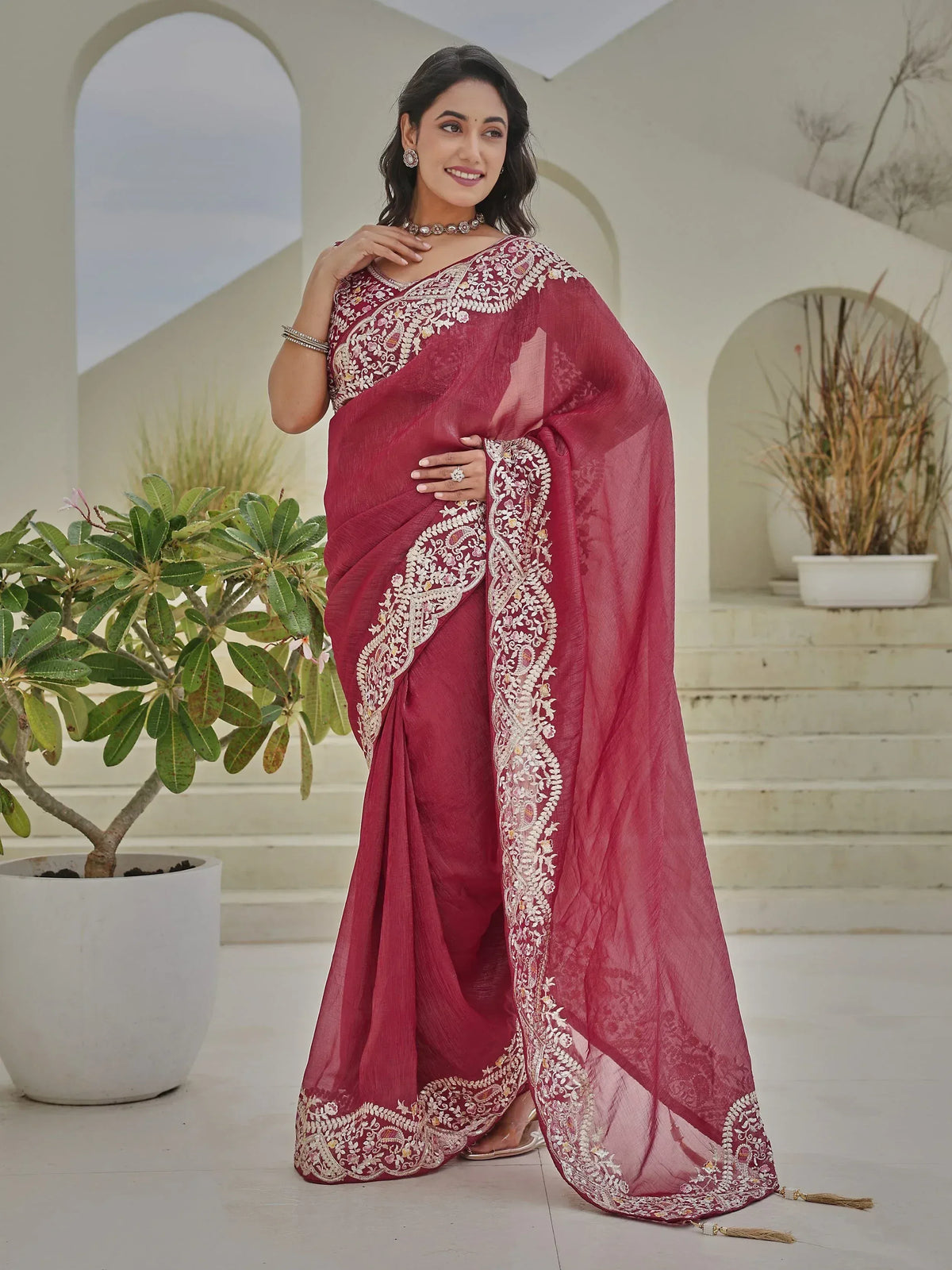 Elegant maroon saree with intricate white embroidery, perfect for Indian ethnic wear occasions.