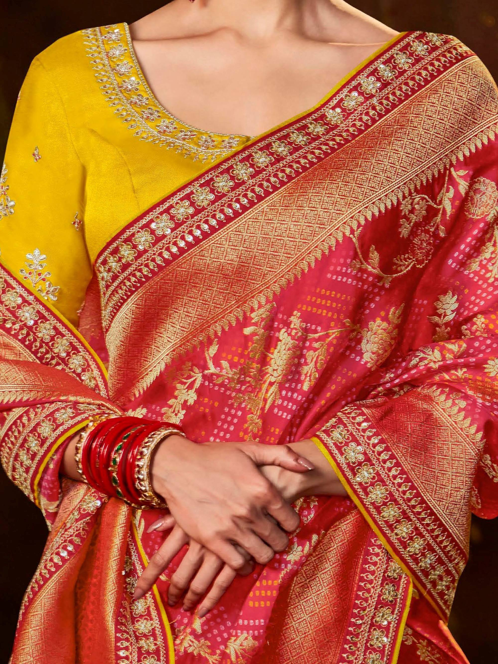 Red and gold embroidered saree with yellow blouse, traditional Indian ethnic wear