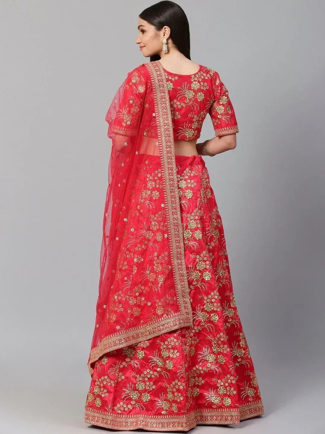 Red floral embroidered lehenga choli with sheer dupatta, perfect for Indian weddings and festive occasions