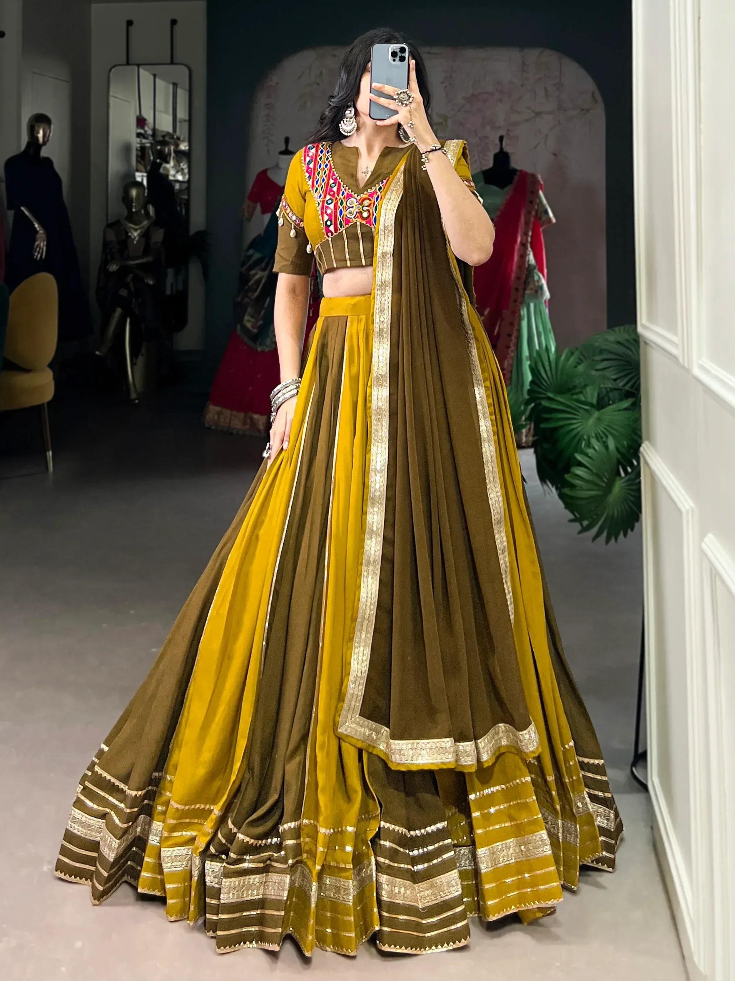 Mustard and olive green lehenga choli with embroidered blouse and gold trim, perfect for Indian ethnic wear.