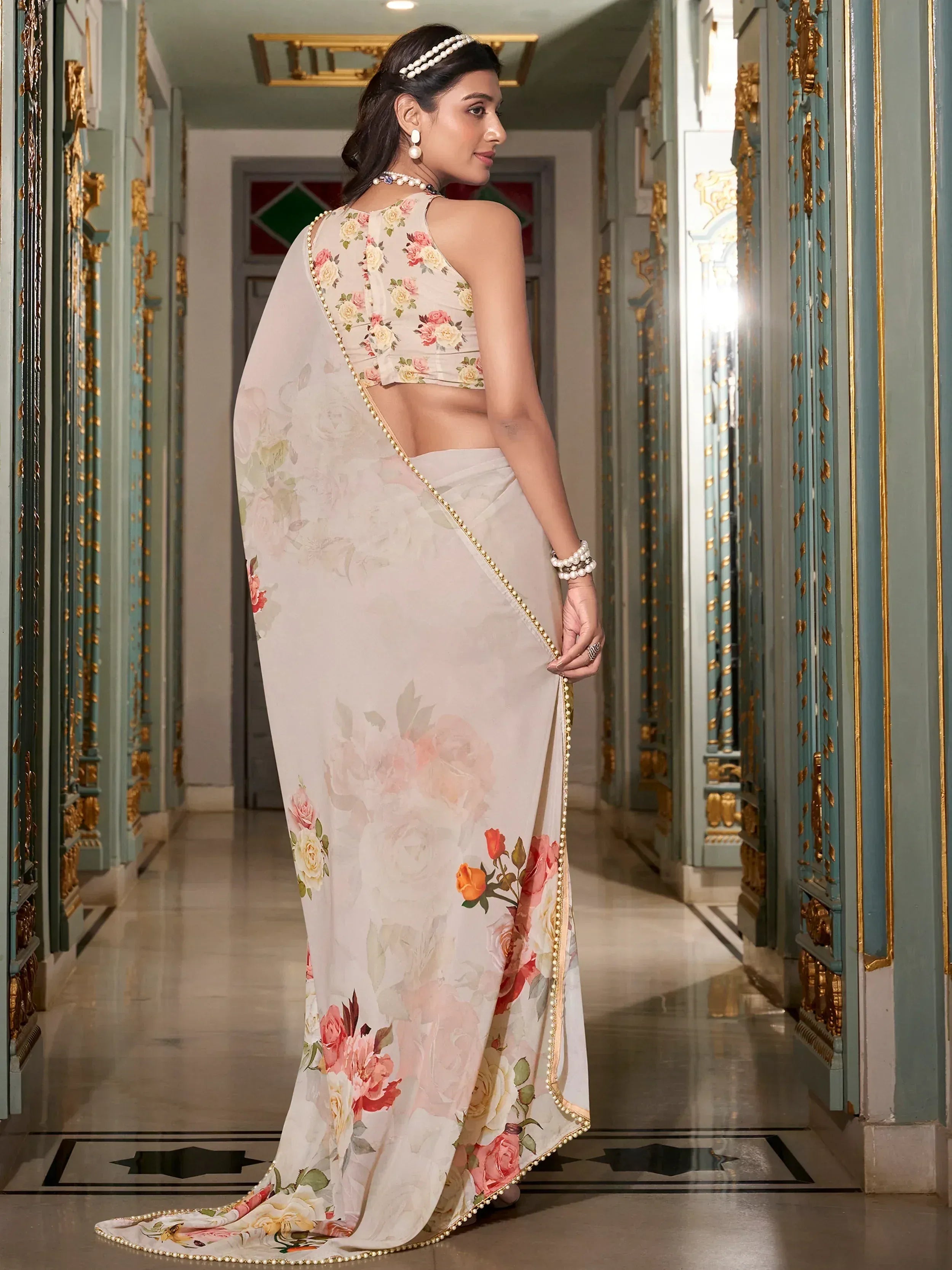 Floral print saree with pearl border, backless blouse, elegant ethnic wear for women