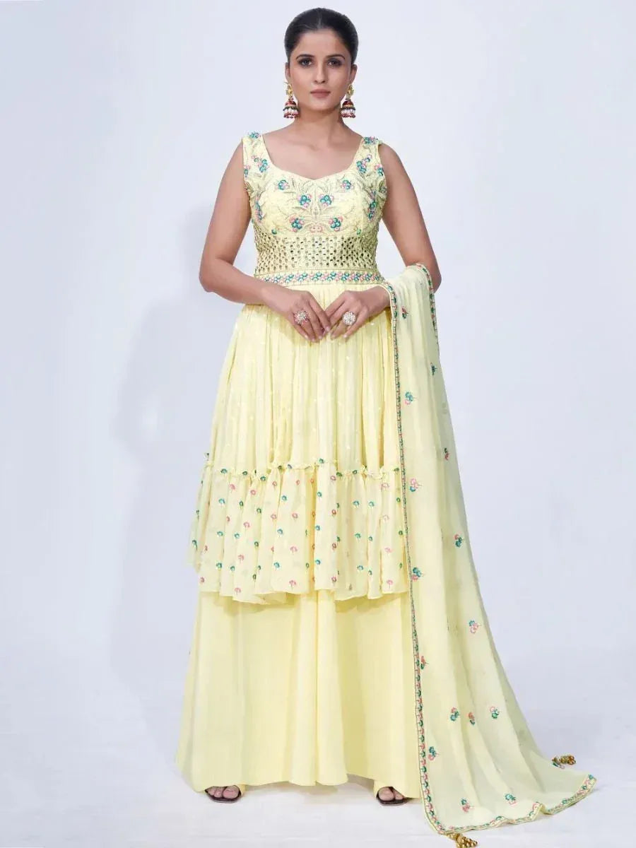 Yellow embroidered anarkali suit with floral detailing and dupatta, perfect for Indian ethnic occasions