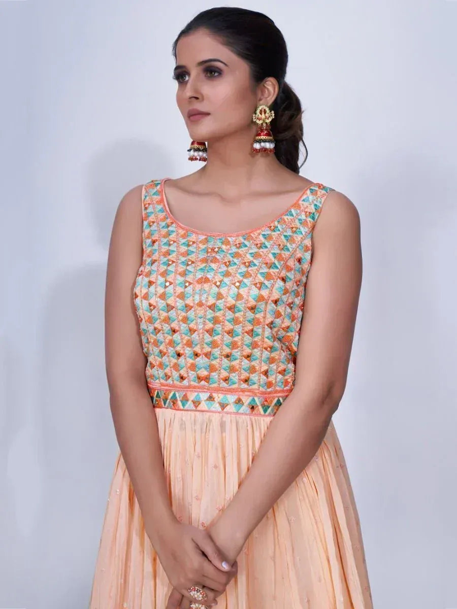 Peach ethnic gown with geometric embroidery, perfect for Indian festive occasions