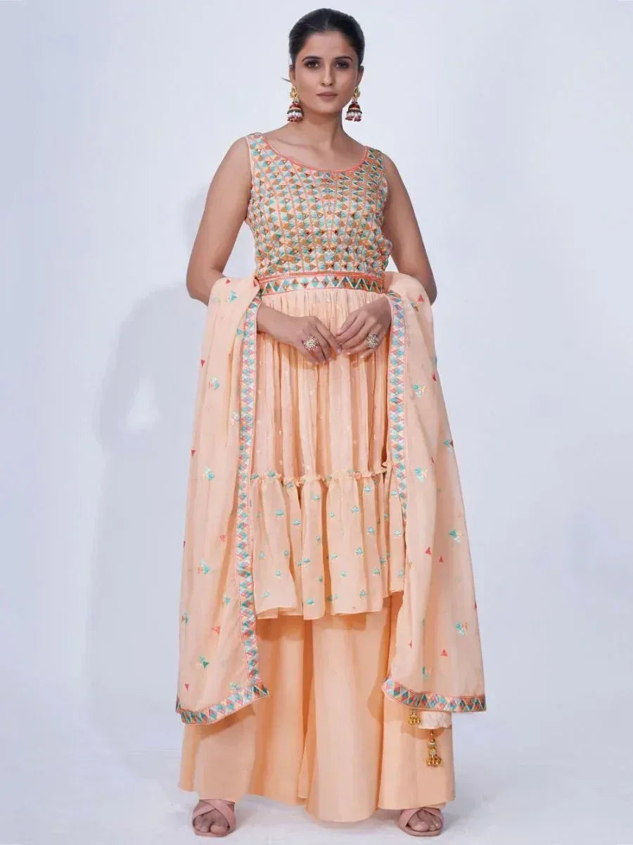 Peach embroidered sharara set with sleeveless top and dupatta, Indian ethnic wear for women