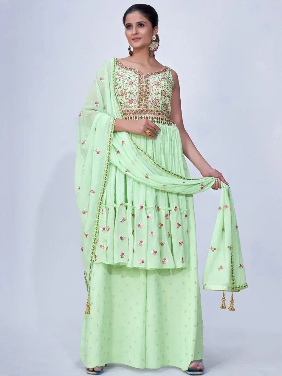 Mint green embroidered palazzo suit with floral detailing and dupatta, ideal for ethnic occasions