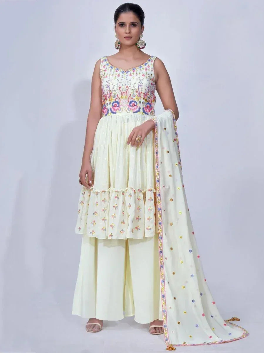 Cream embroidered anarkali suit with floral motifs and matching dupatta, ideal for Indian ethnic occasions