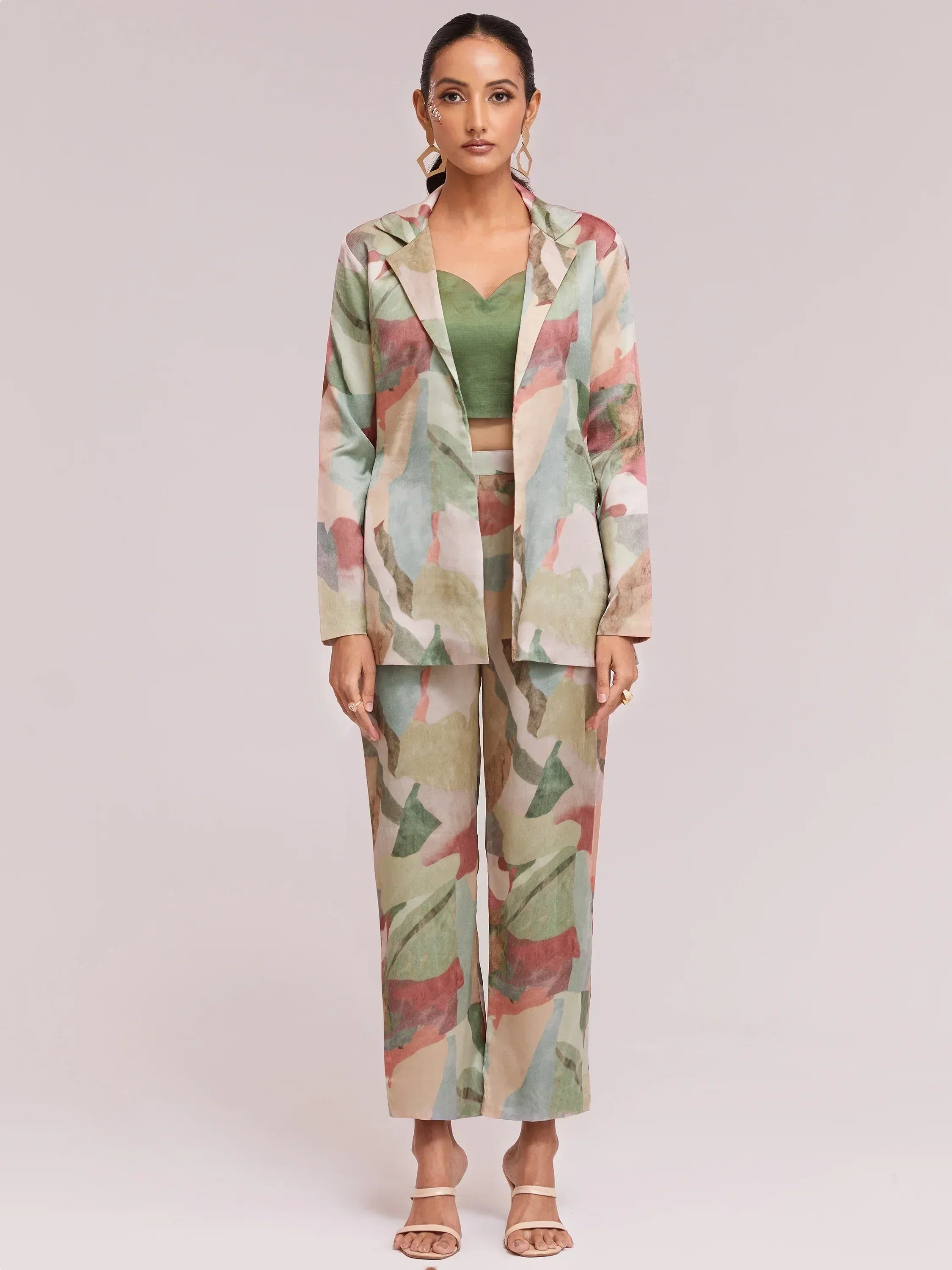 Woman in floral print ethnic pantsuit with green crop top, stylish Indian wear for modern occasions