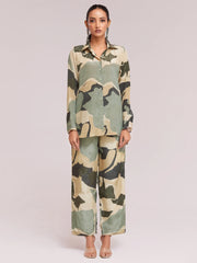 Woman in green and beige camouflage print shirt and wide-leg pants, Ethnic Plus fashion