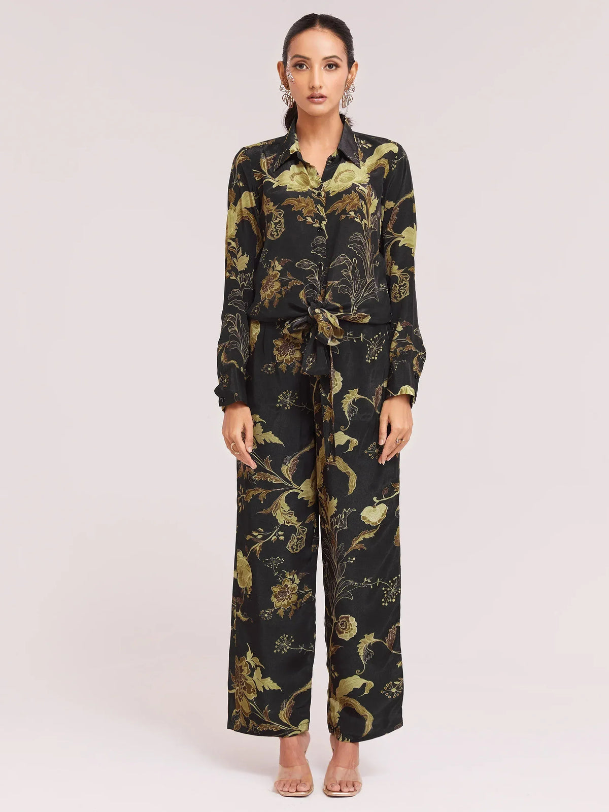 Black and gold floral print ethnic palazzo suit with tie-waist top, stylish Indian wear