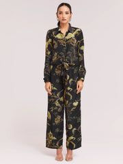 Woman in black floral printed kurta set, stylish Indian ethnic wear from Ethnic Plus