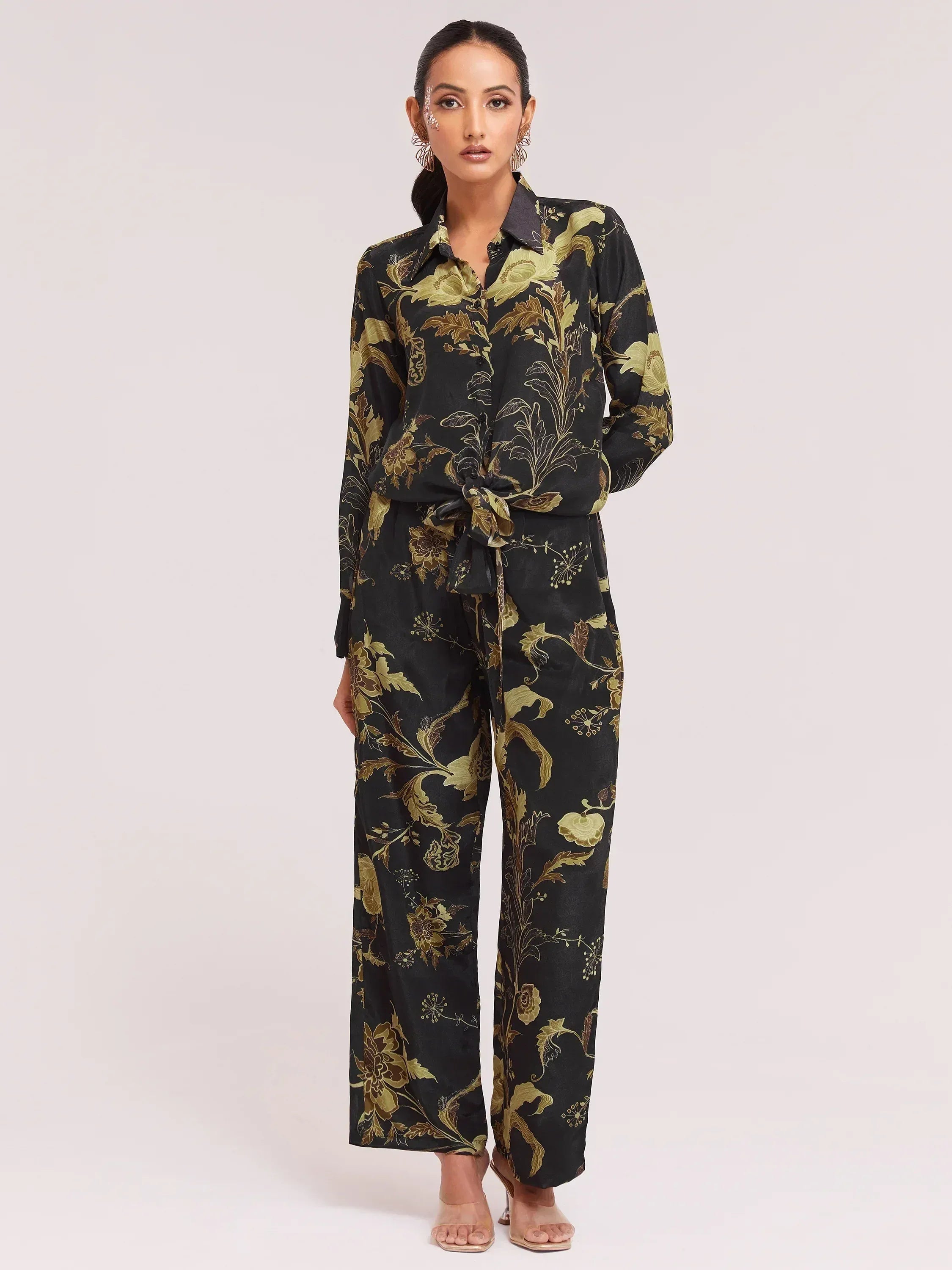 Black and gold floral print ethnic palazzo set with tie-front top, perfect for festive occasions