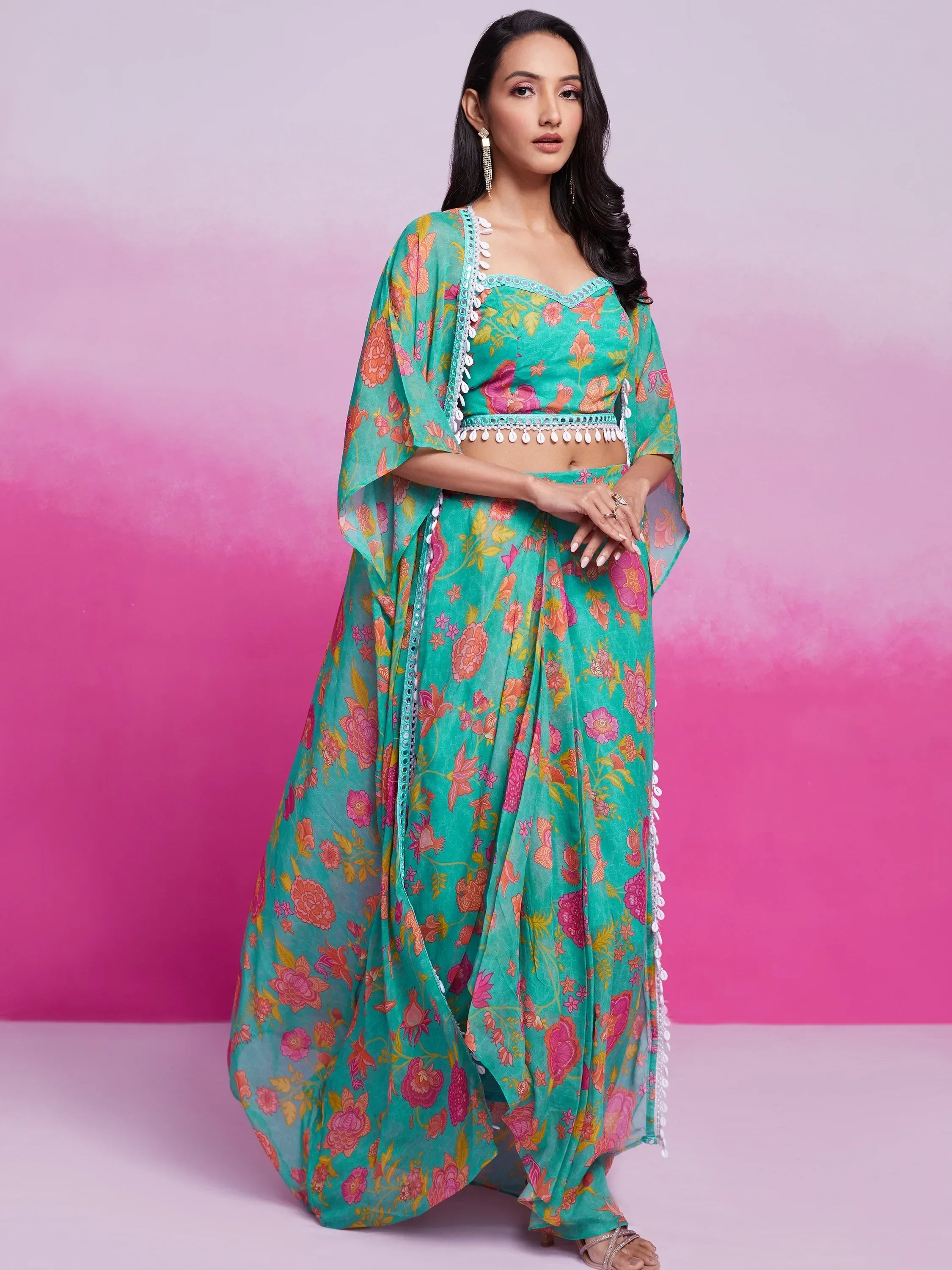 Woman in a teal floral printed lehenga choli with dupatta, Indian ethnic wear