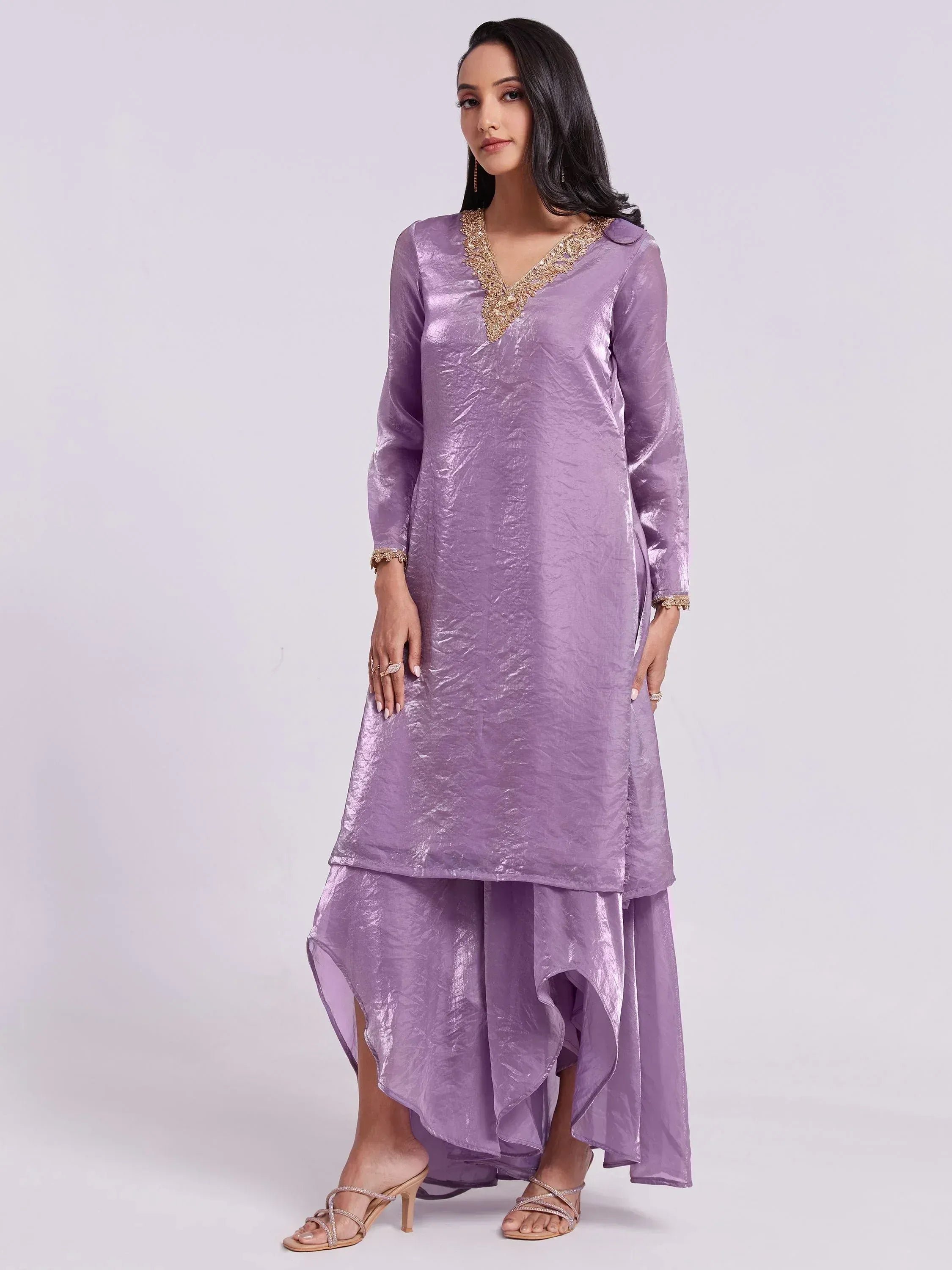 Lavender ethnic kurta with gold embroidery and layered skirt, perfect for Indian festive occasions