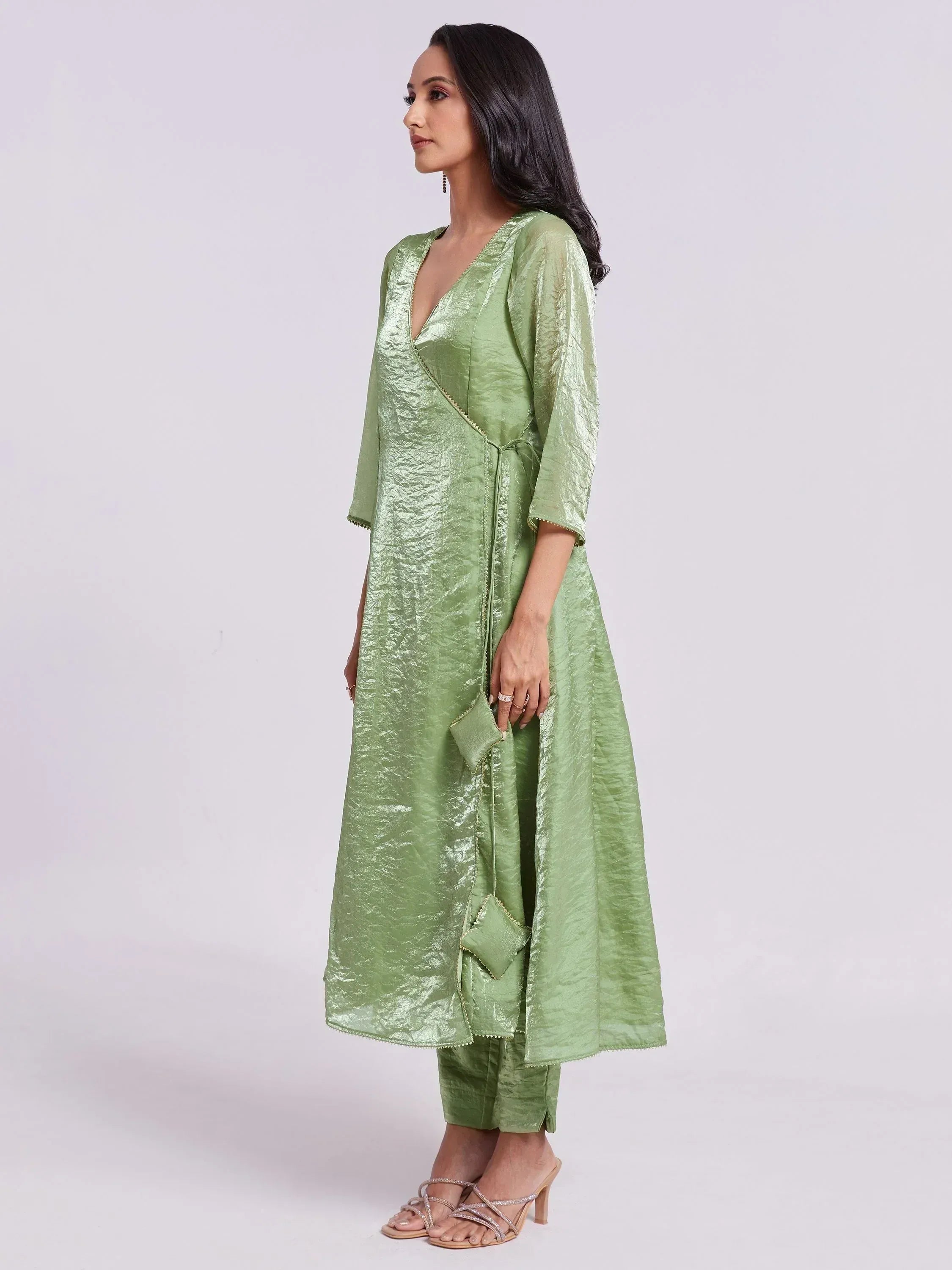 Mint green ethnic kurta set with V-neck, tie waist, and matching pants for women