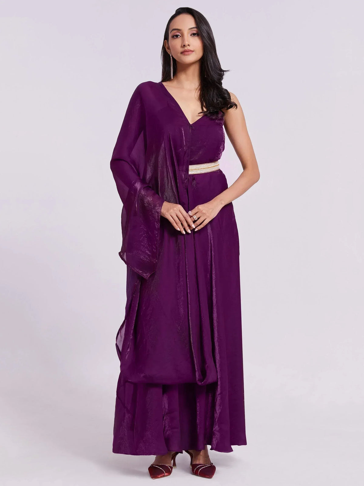 Purple ethnic gown with draped sleeves and embellished belt, perfect for Indian occasions