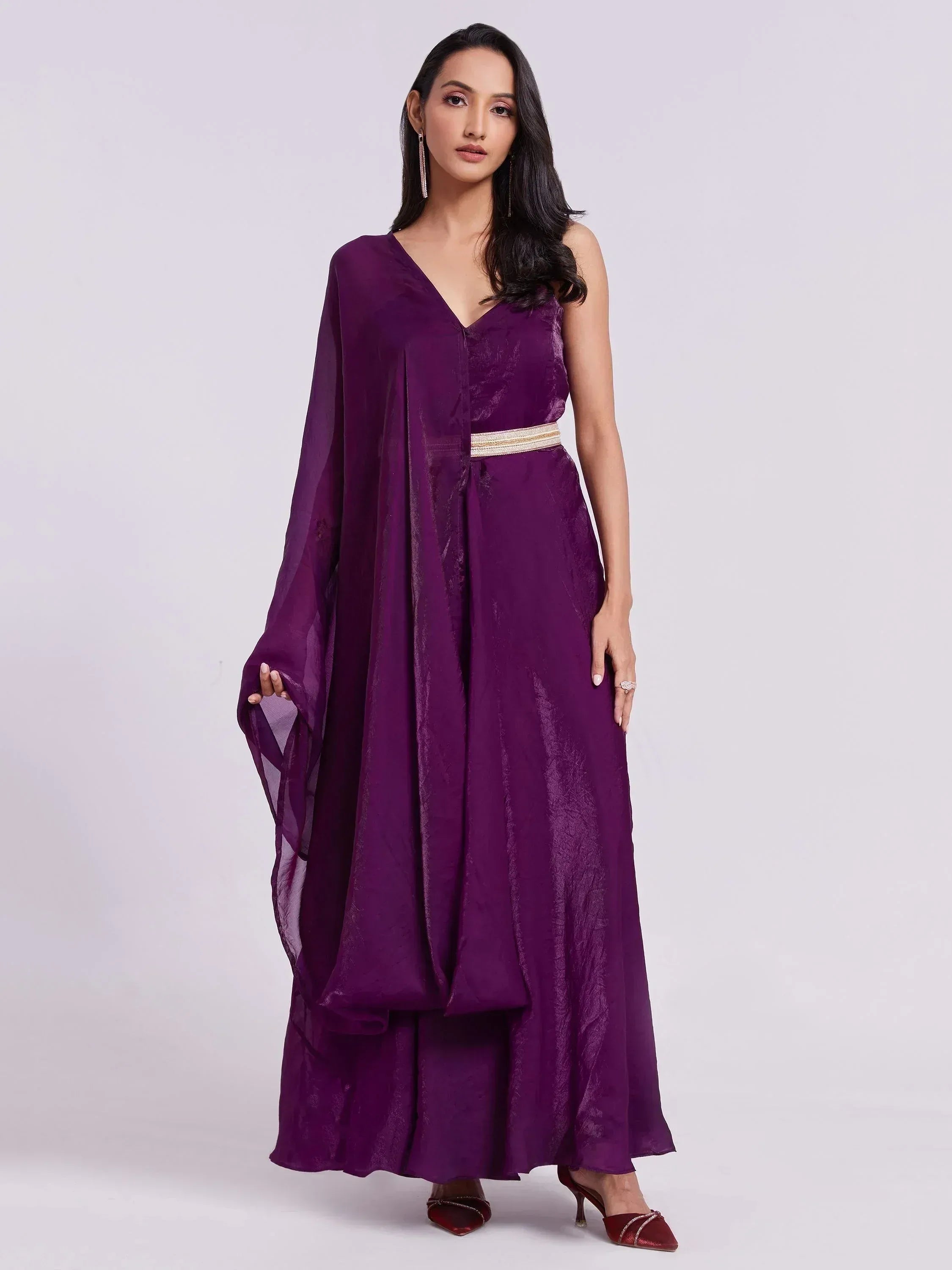 Purple ethnic gown with sheer cape and gold waistband, perfect for Indian occasions
