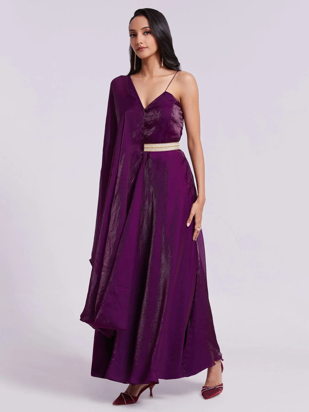 Purple ethnic gown with cape sleeve, V-neck, and gold belt for women's festive wear