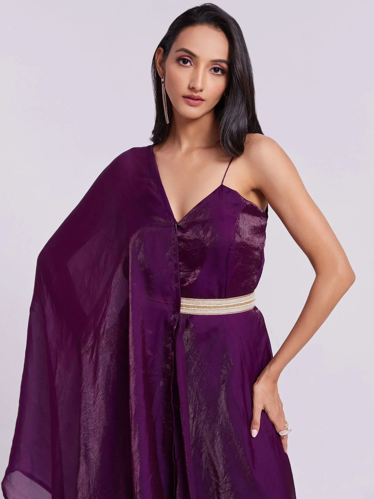 Purple ethnic gown with cape and gold belt, perfect for Indian occasions