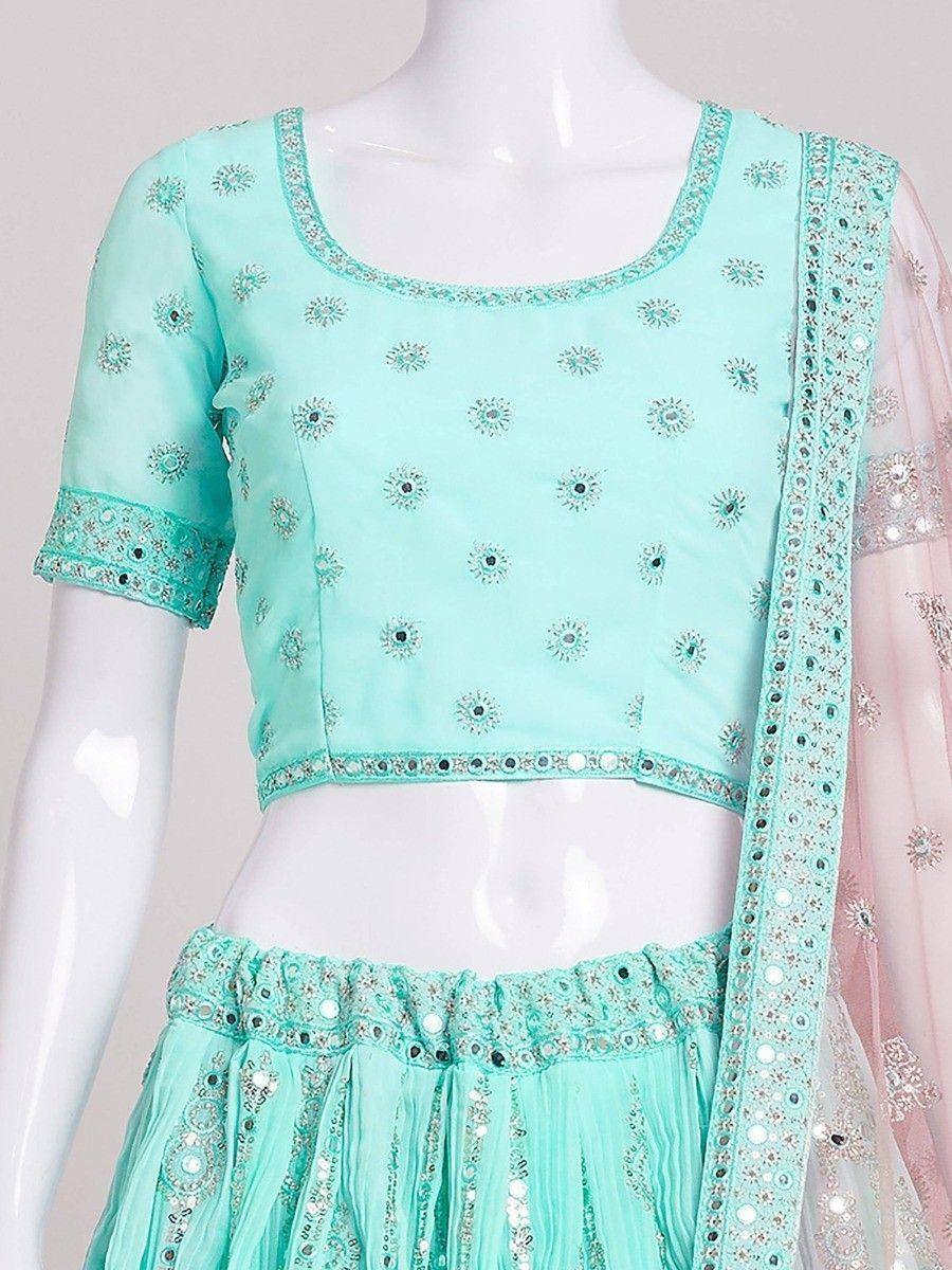 Mint green embroidered lehenga choli with mirror work and sheer dupatta, ethnic Indian wear