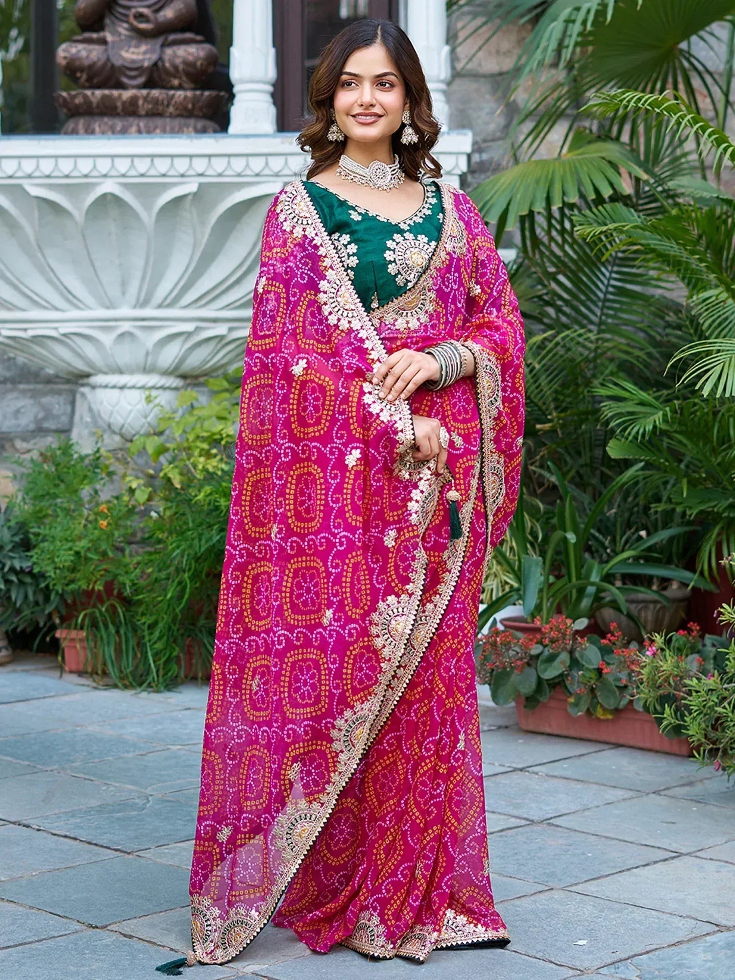 Pink and green embroidered saree with gold detailing, perfect for Indian ethnic wear occasions