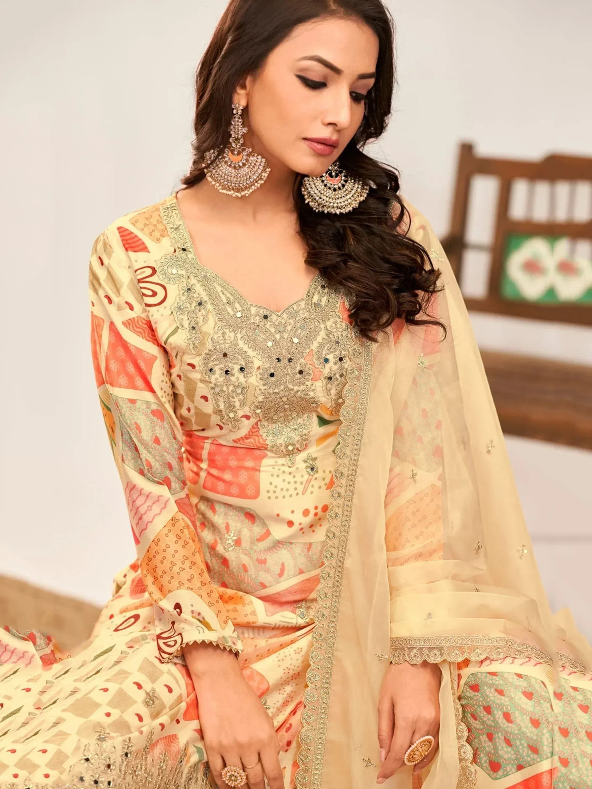 Elegant Indian ethnic wear with intricate embroidery and vibrant patterns, perfect for festive occasions.