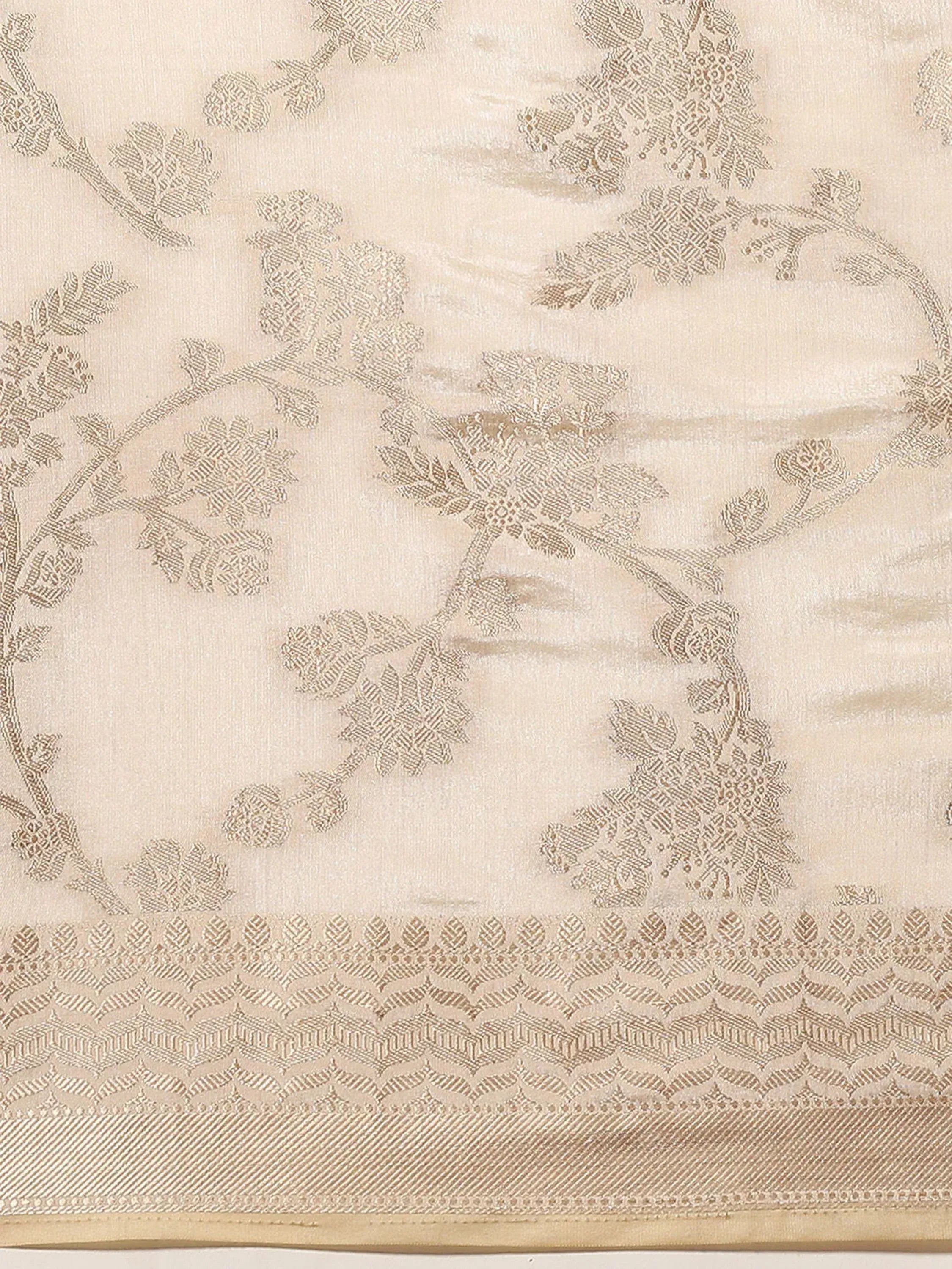 Cream ethnic saree with intricate floral brocade and border design, perfect for Indian occasions