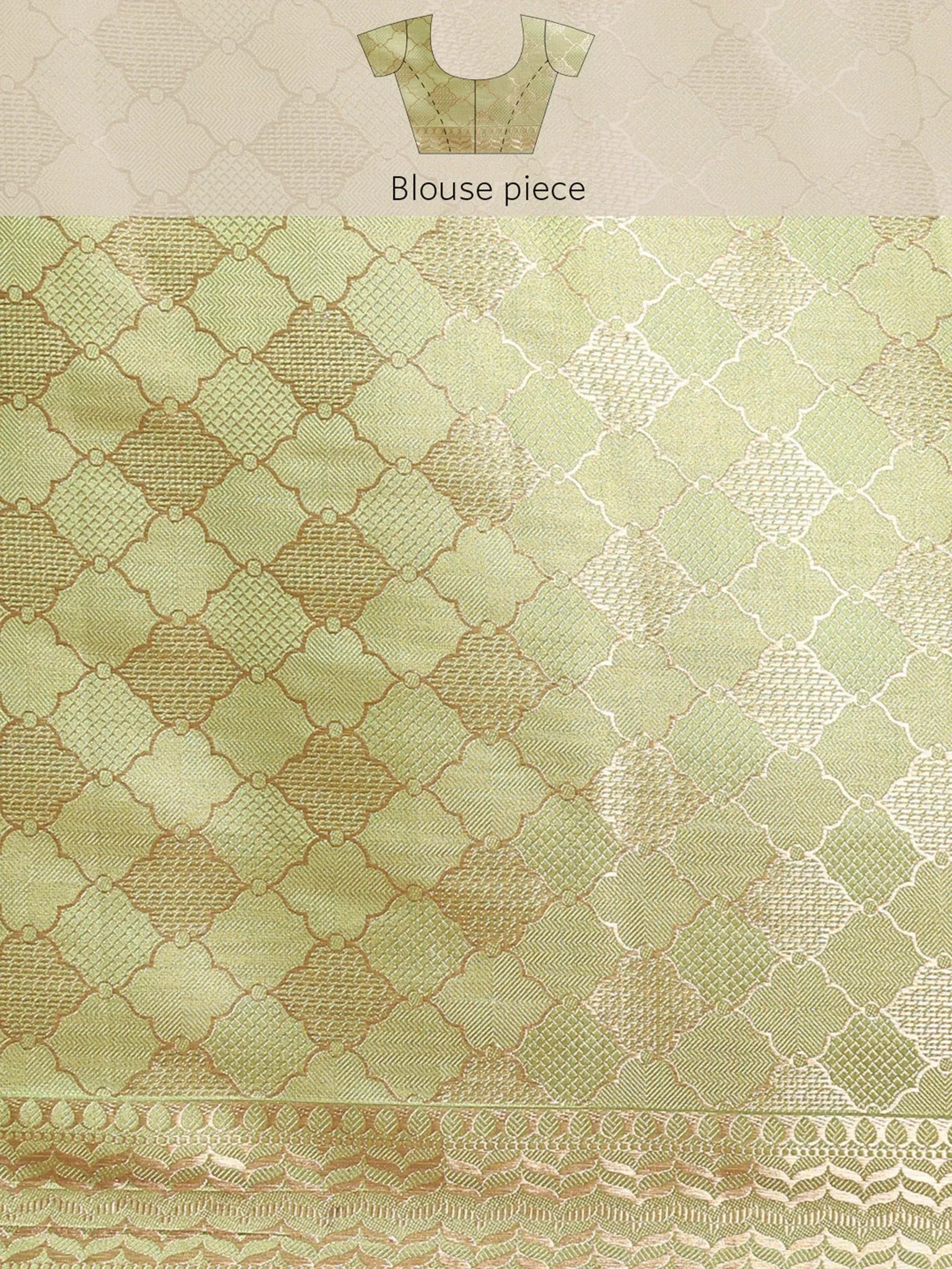 Green and gold patterned blouse fabric with intricate geometric design