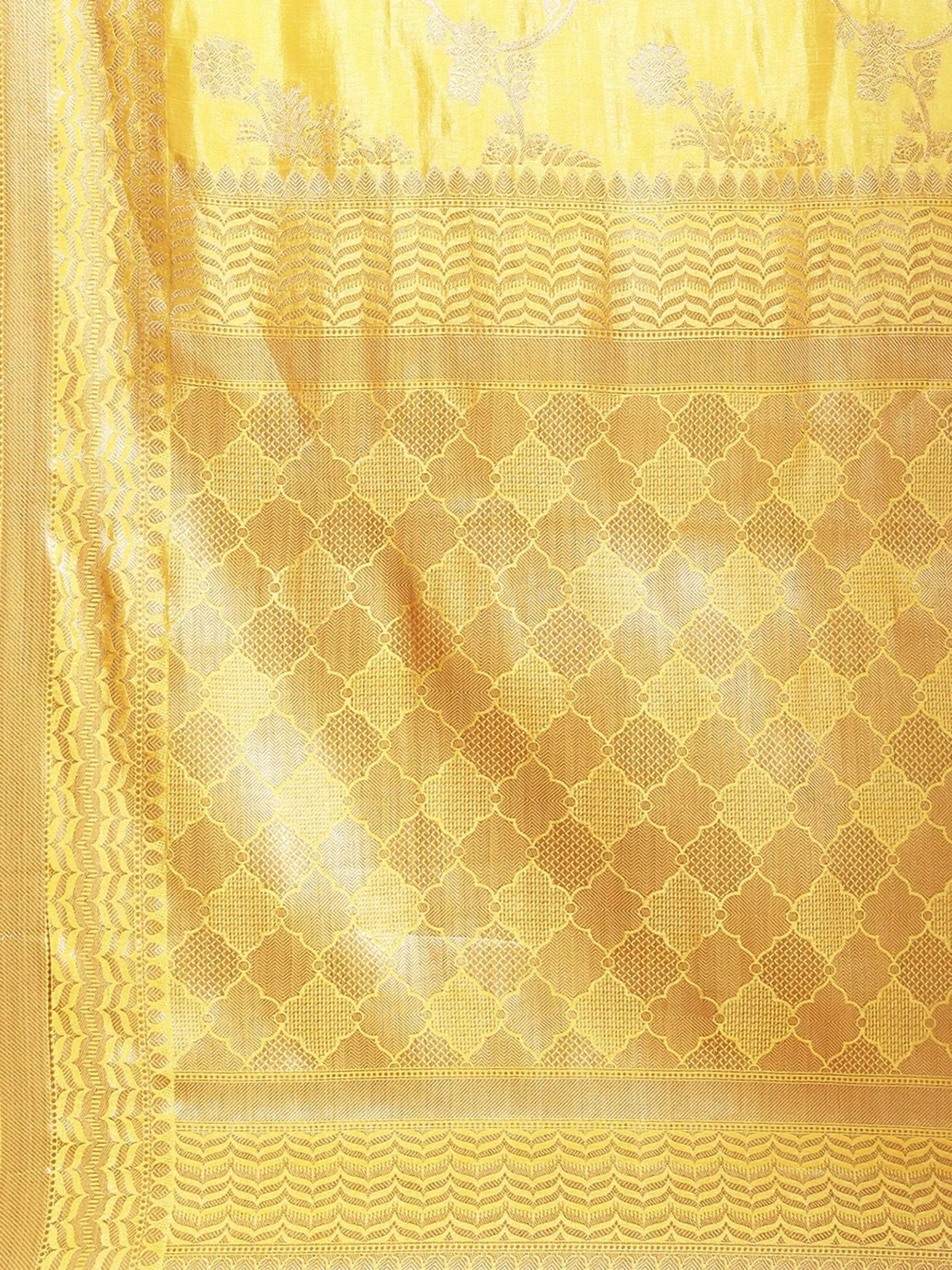 Yellow ethnic saree with intricate diamond and floral patterns, perfect for traditional Indian wear.
