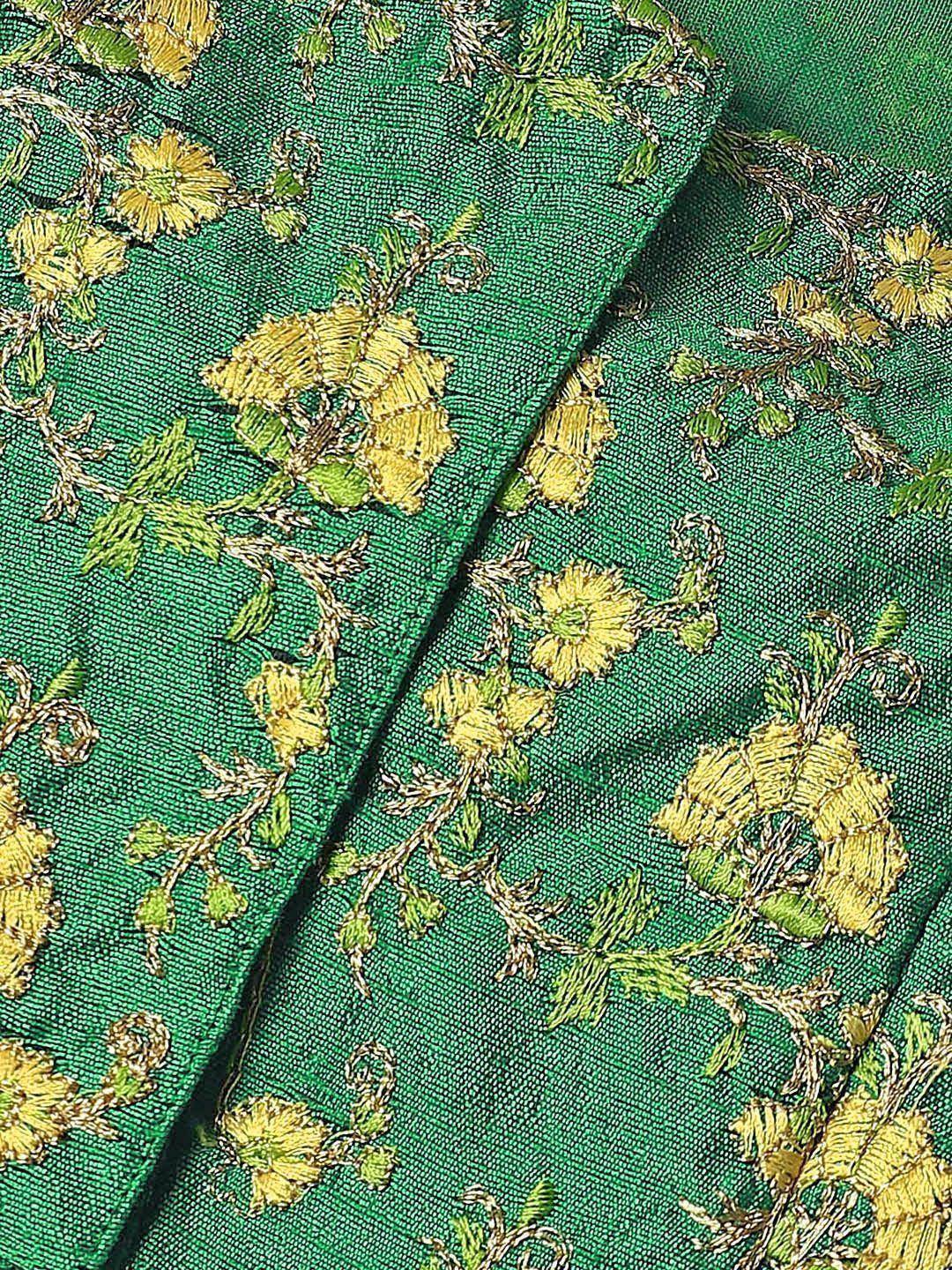 Green ethnic fabric with yellow floral embroidery, ideal for designer lehenga or saree